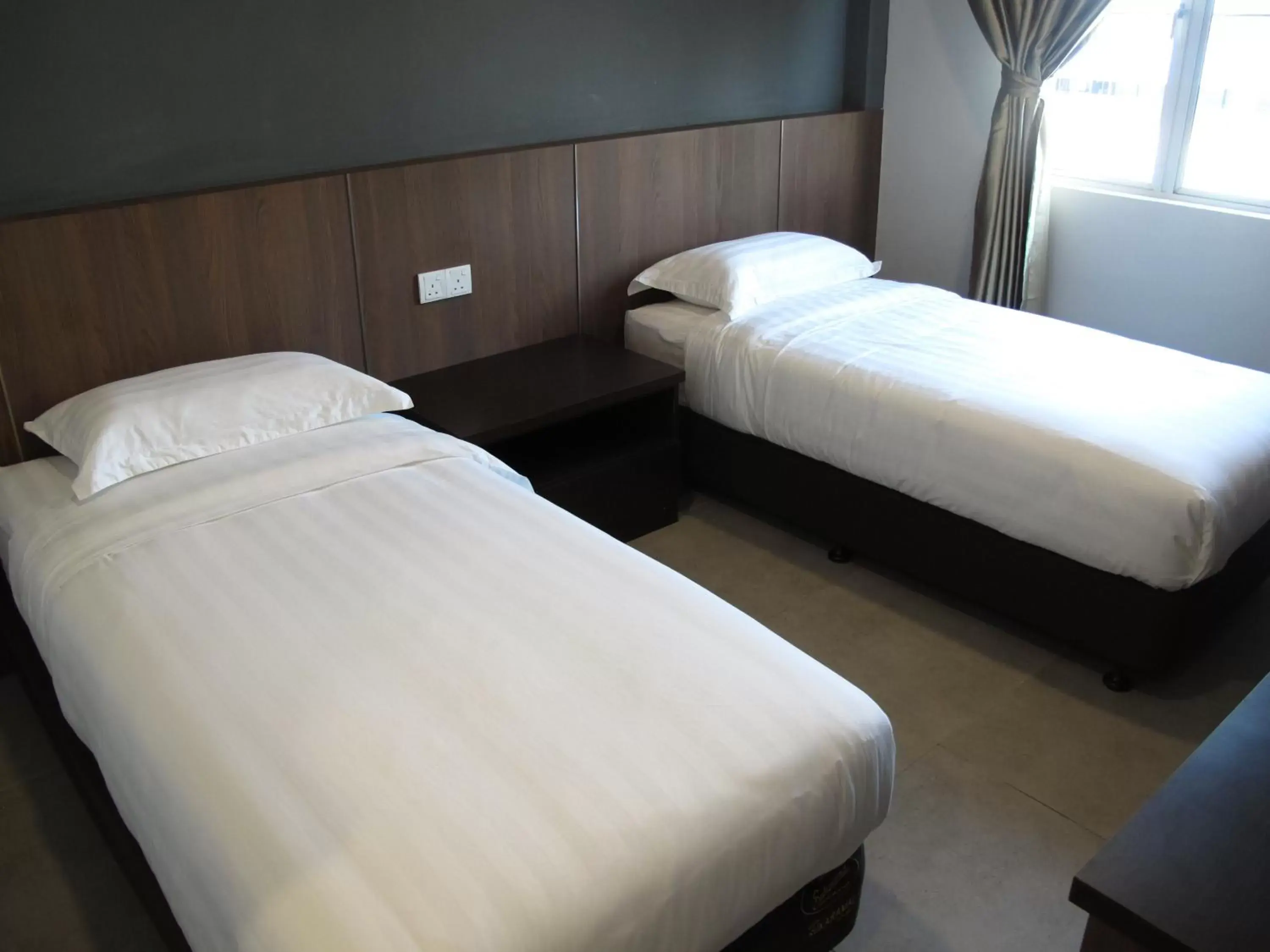 Bed in HOTEL SUKARAMAI