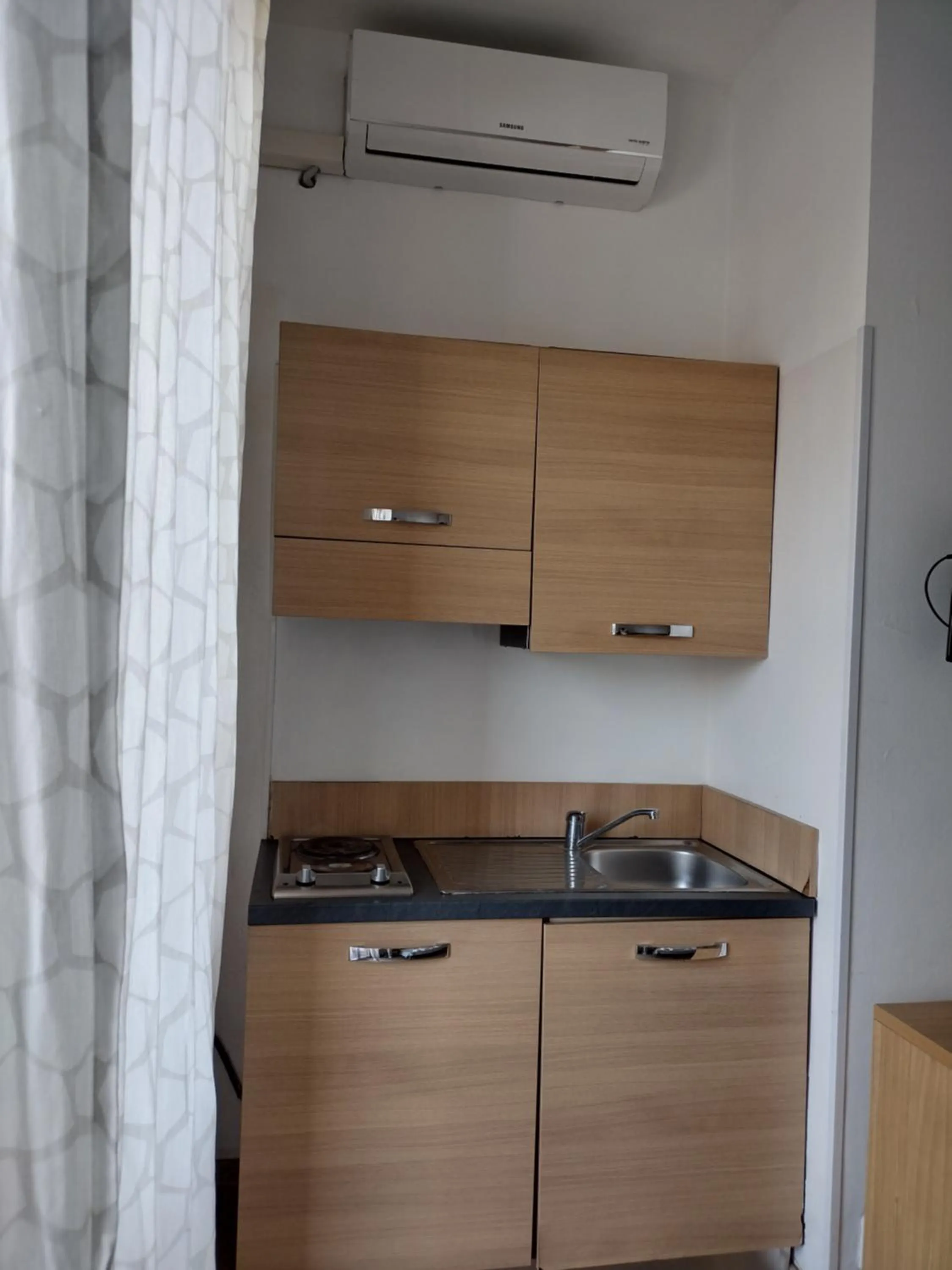 Kitchen or kitchenette in Albergo Guido Reni