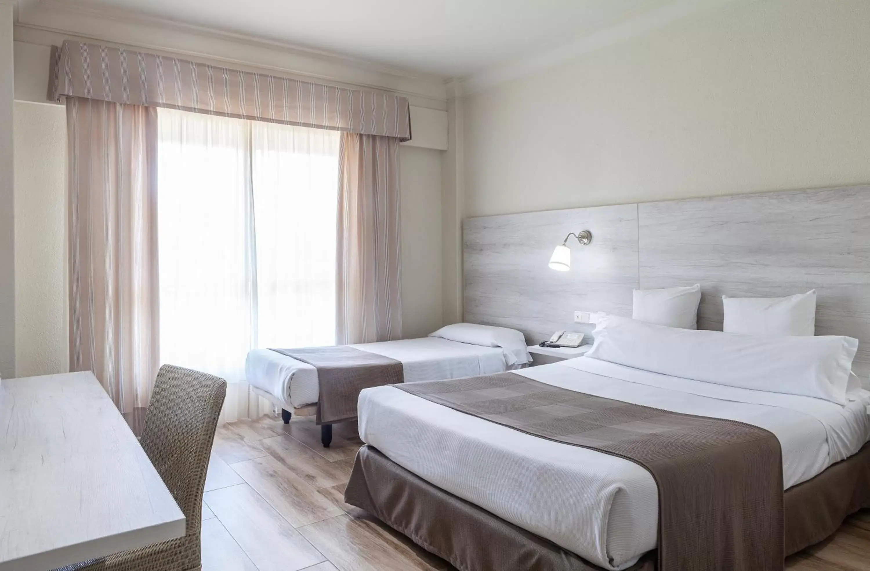 Bed in Hotel Jerez & Spa