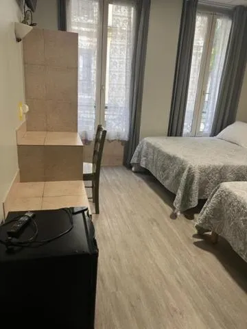 Bed in Hôtel Jarry Confort