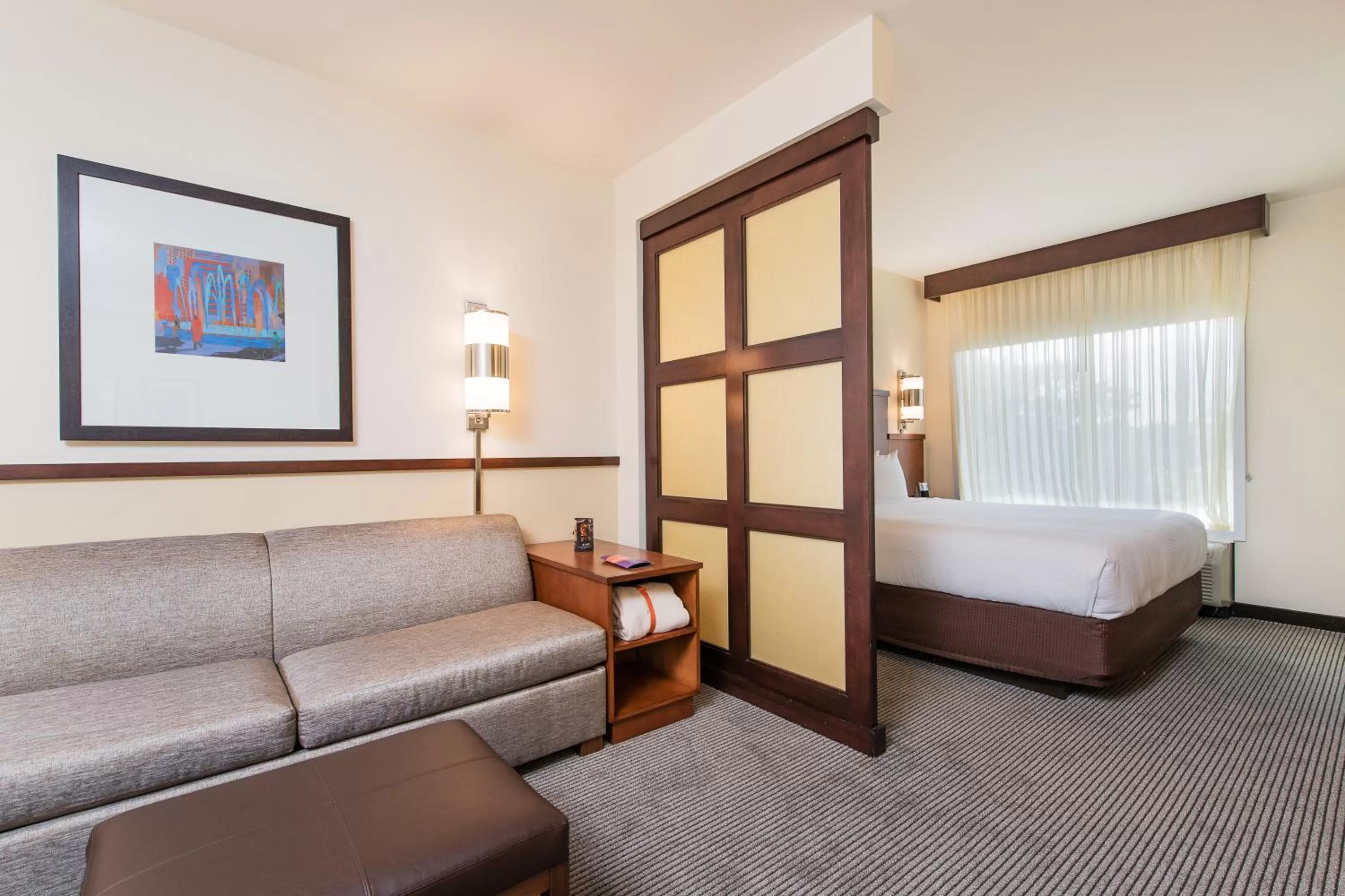 Living room, Bed in Hyatt Place Charleston Airport / Convention Center
