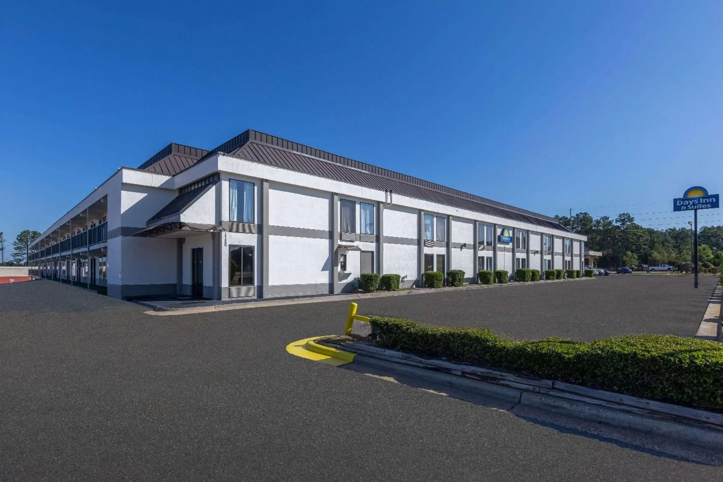 Property Building in Days Inn & Suites by Wyndham Fort Bragg/Cross Creek Mall