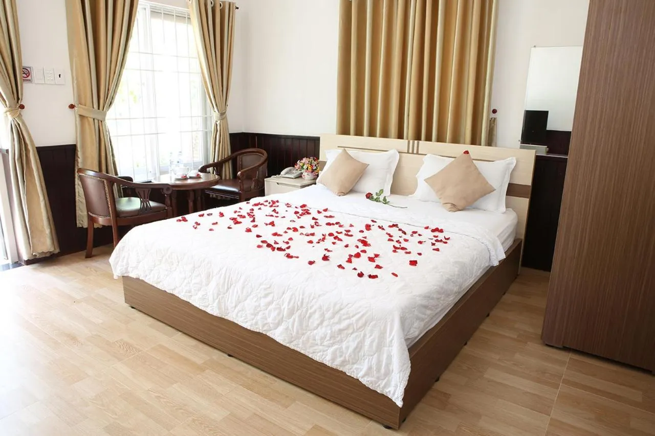 Bed in Huynh Gia Bungalow