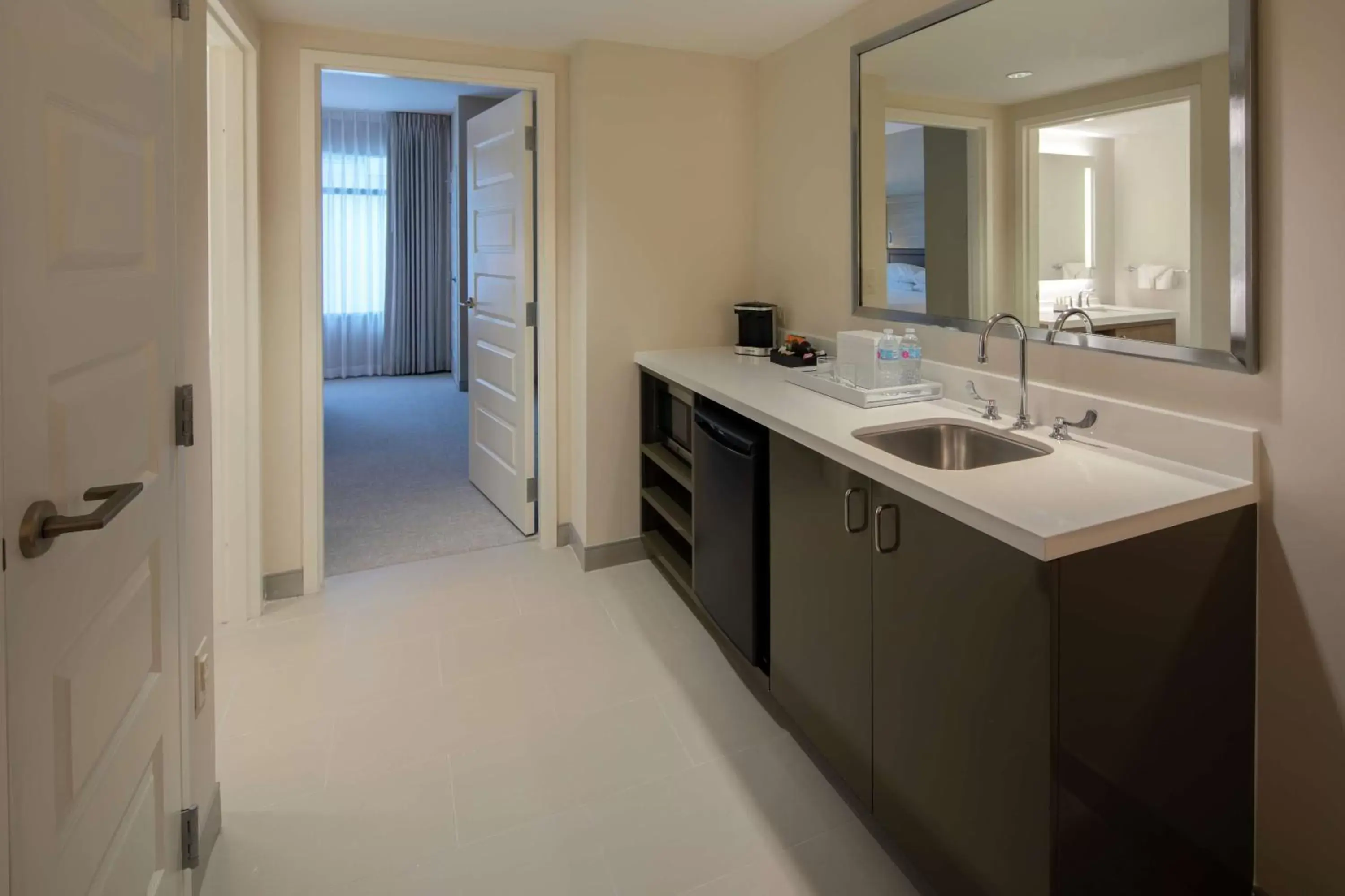 Bathroom, Kitchen/Kitchenette in Embassy Suites St Augustine Beach Oceanfront Resort