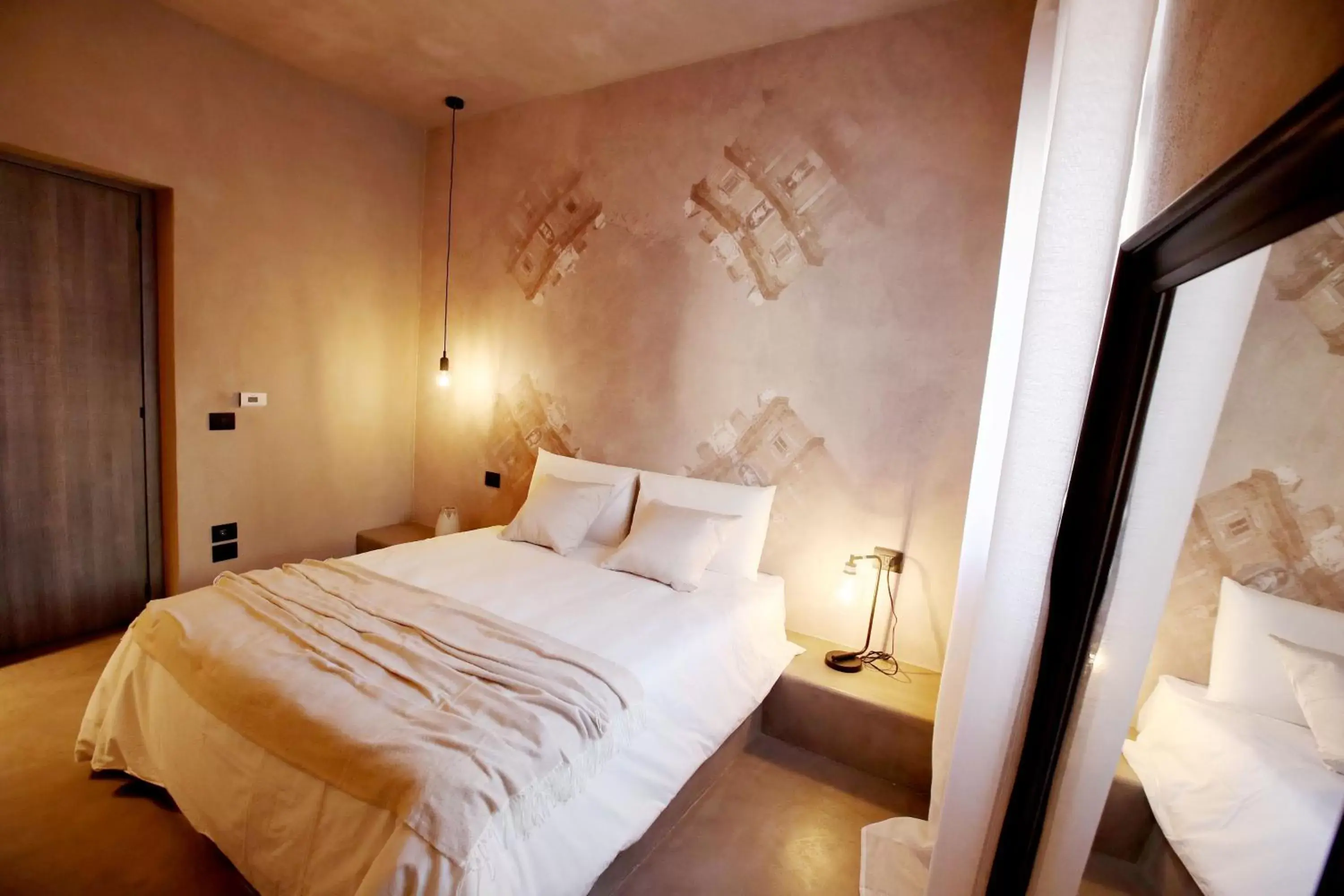 Bed in Casa Nostra Luxury Suites