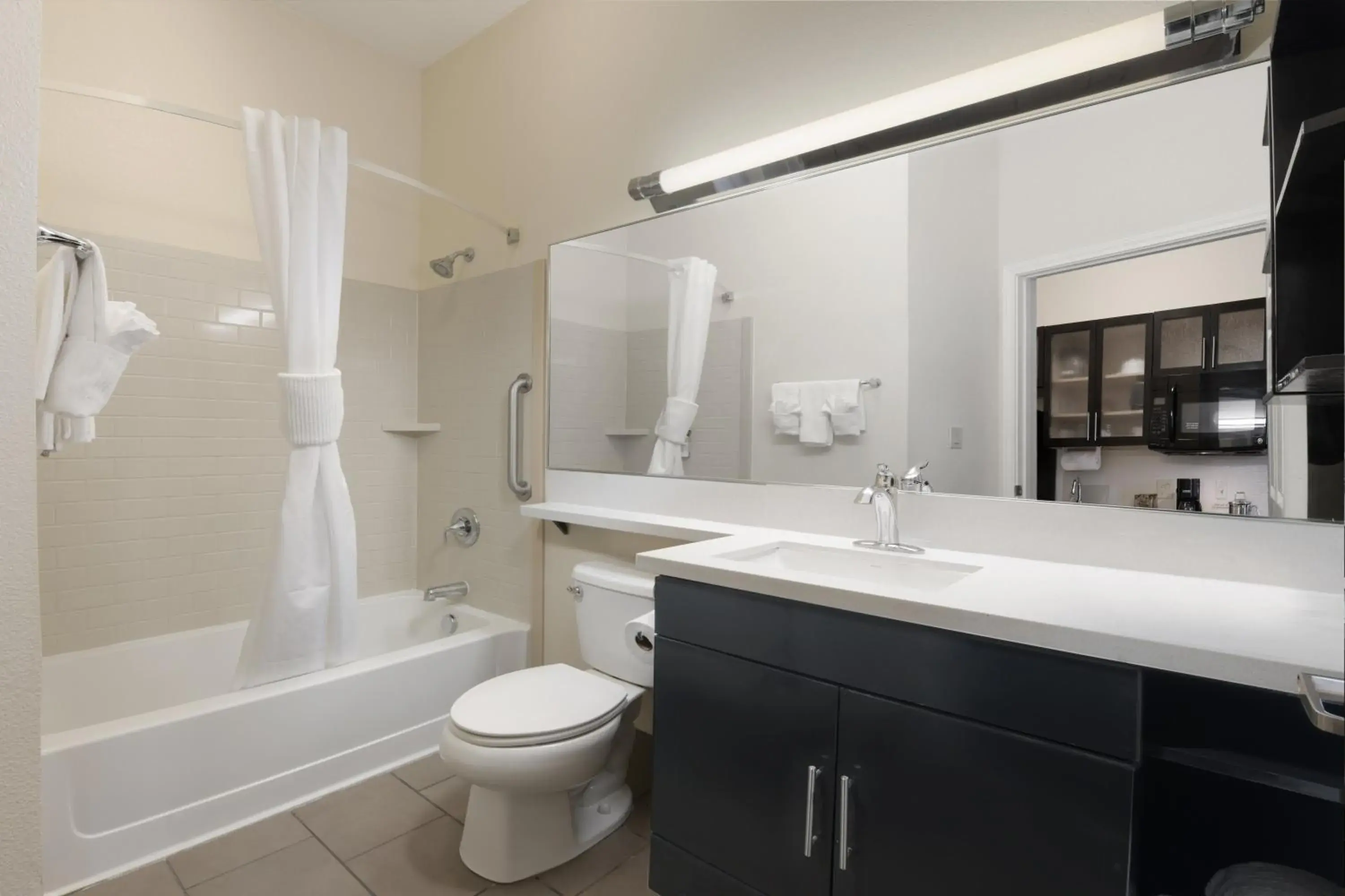 Bathroom in Candlewood Suites Odessa, an IHG Hotel