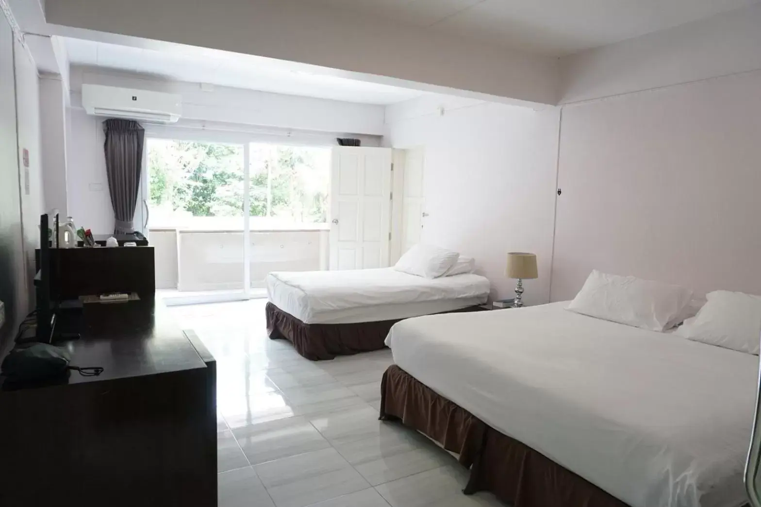 Bed in The Farm House Hotel Ranong