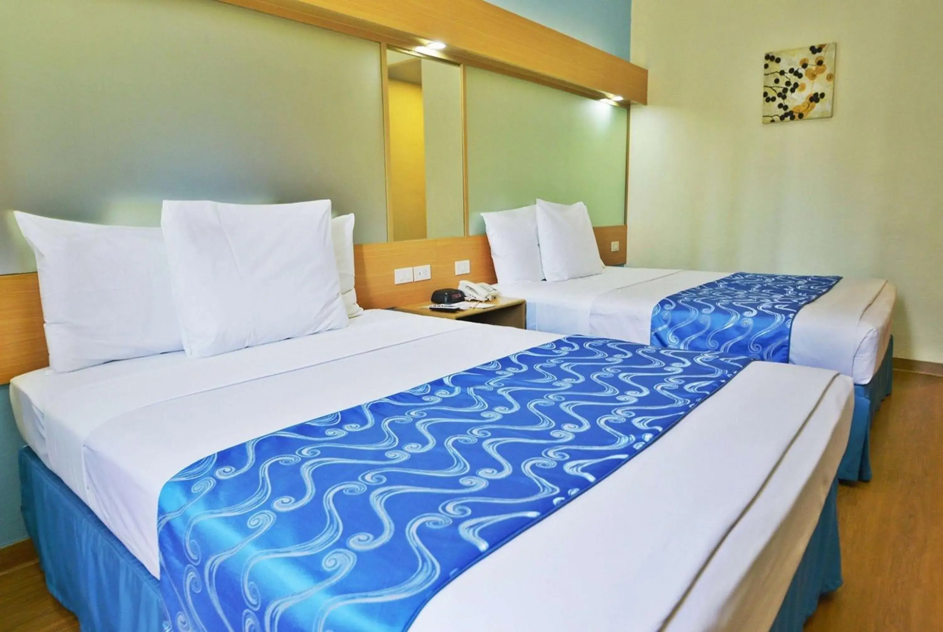 Photo of the whole room, Bed in Microtel by Wyndham Davao