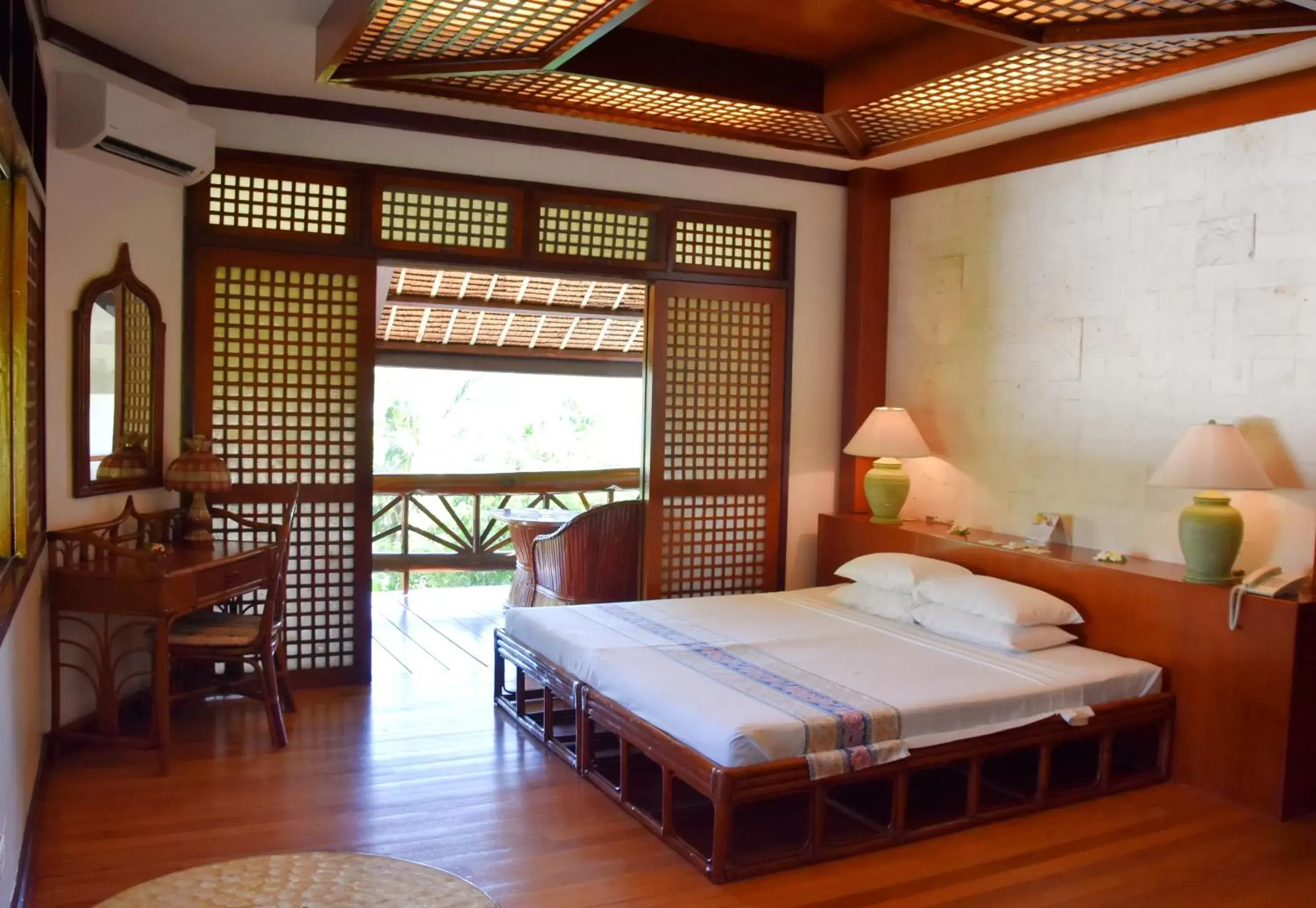 Bedroom, Bed in Badian Island Wellness Resort