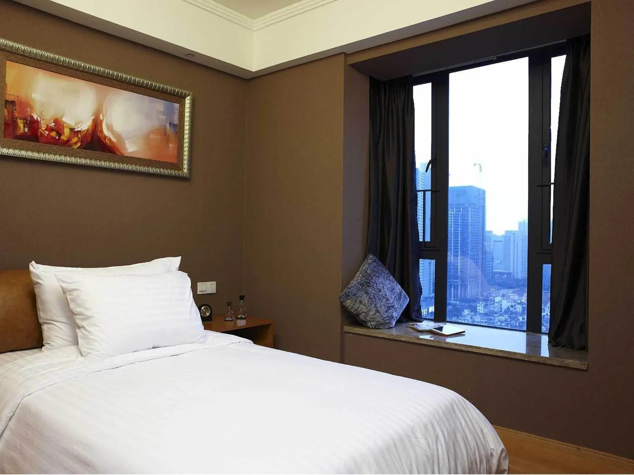 Bed in Dan Executive Hotel Apartment Zhujiang New Town