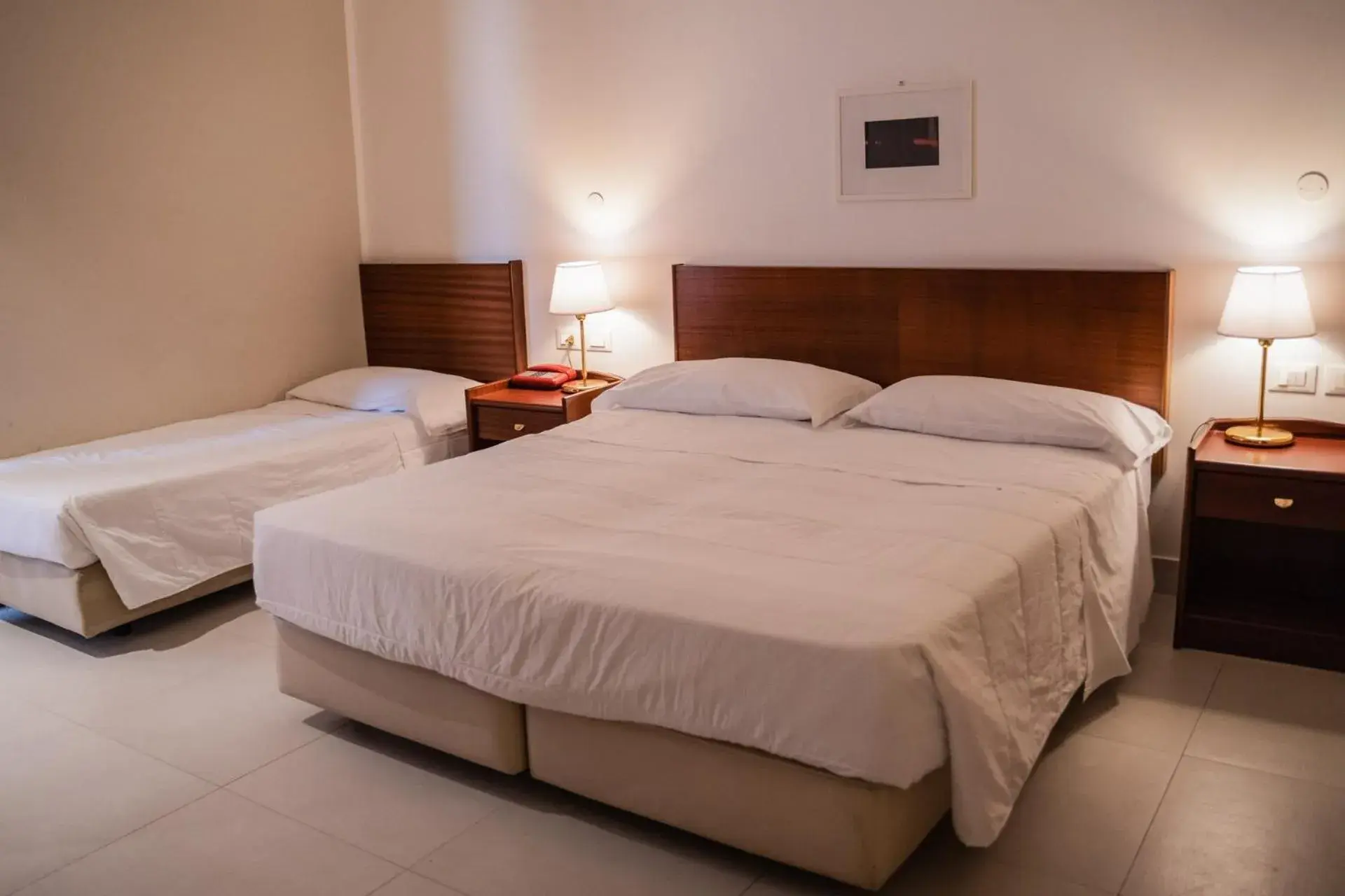 Bed in Hotel Mediterraneo