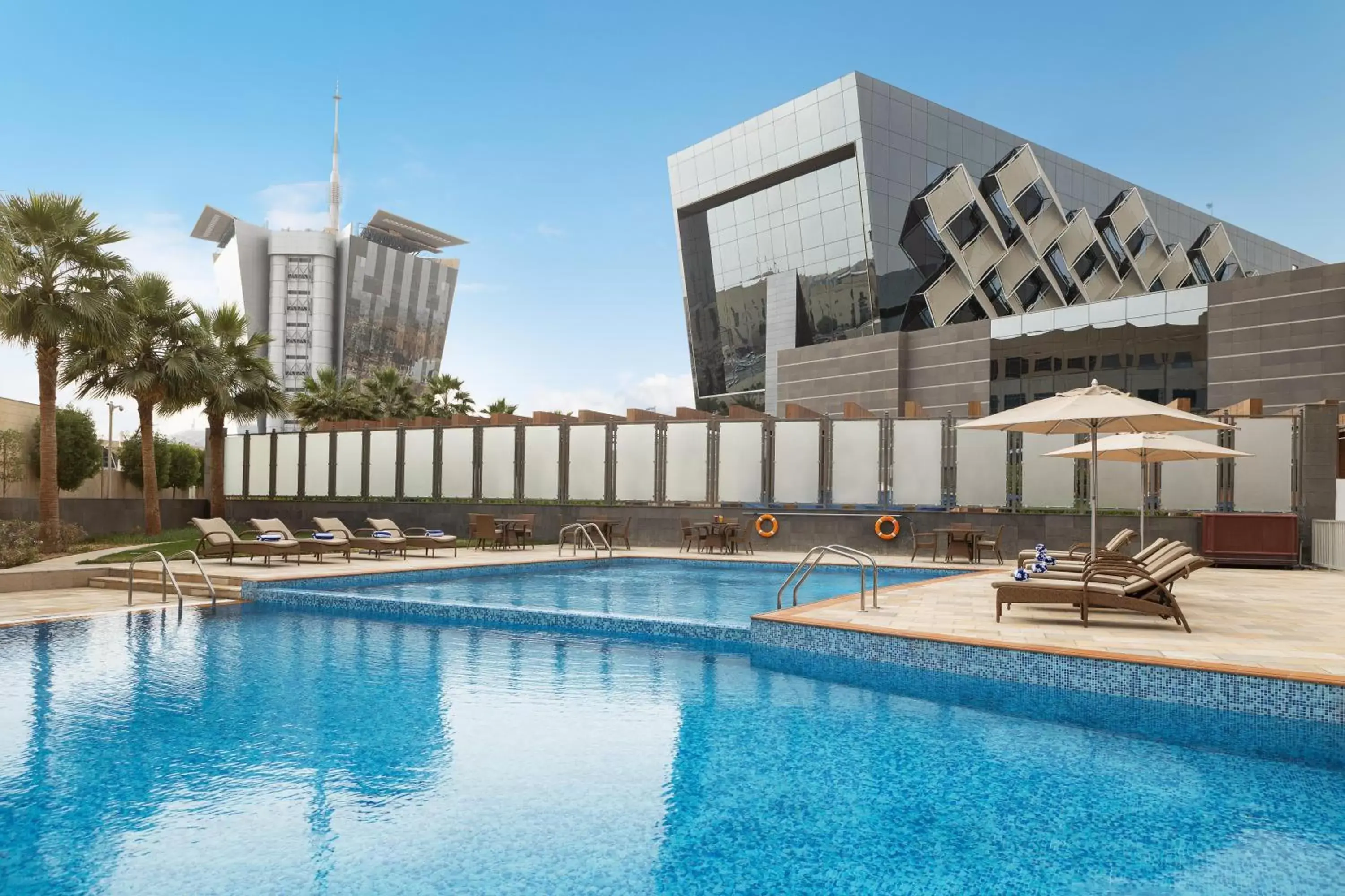 Swimming pool, Property Building in Crowne Plaza Riyadh - RDC Hotel & Convention, an IHG Hotel