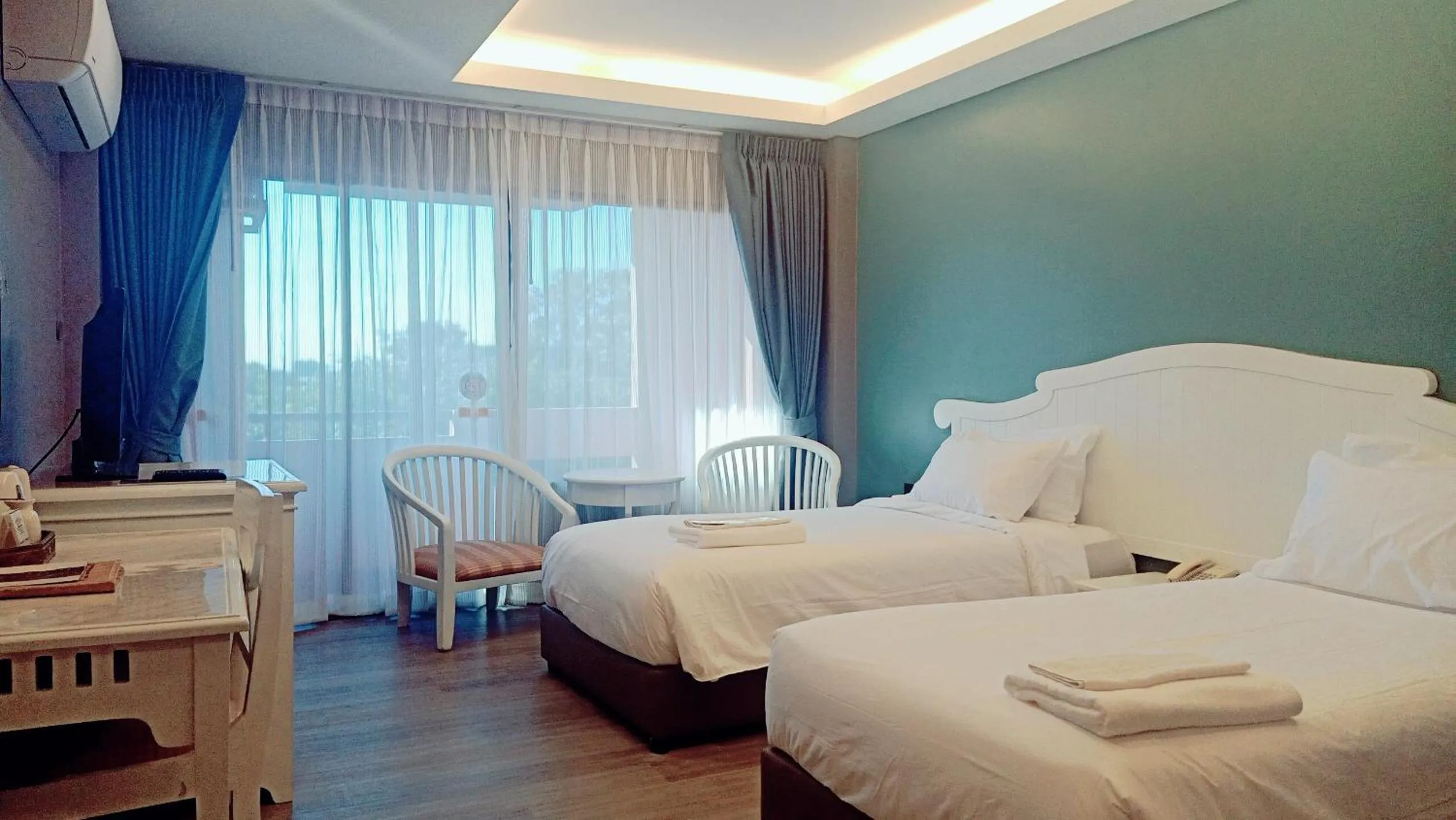 Bed in Chiangmai Gate Hotel