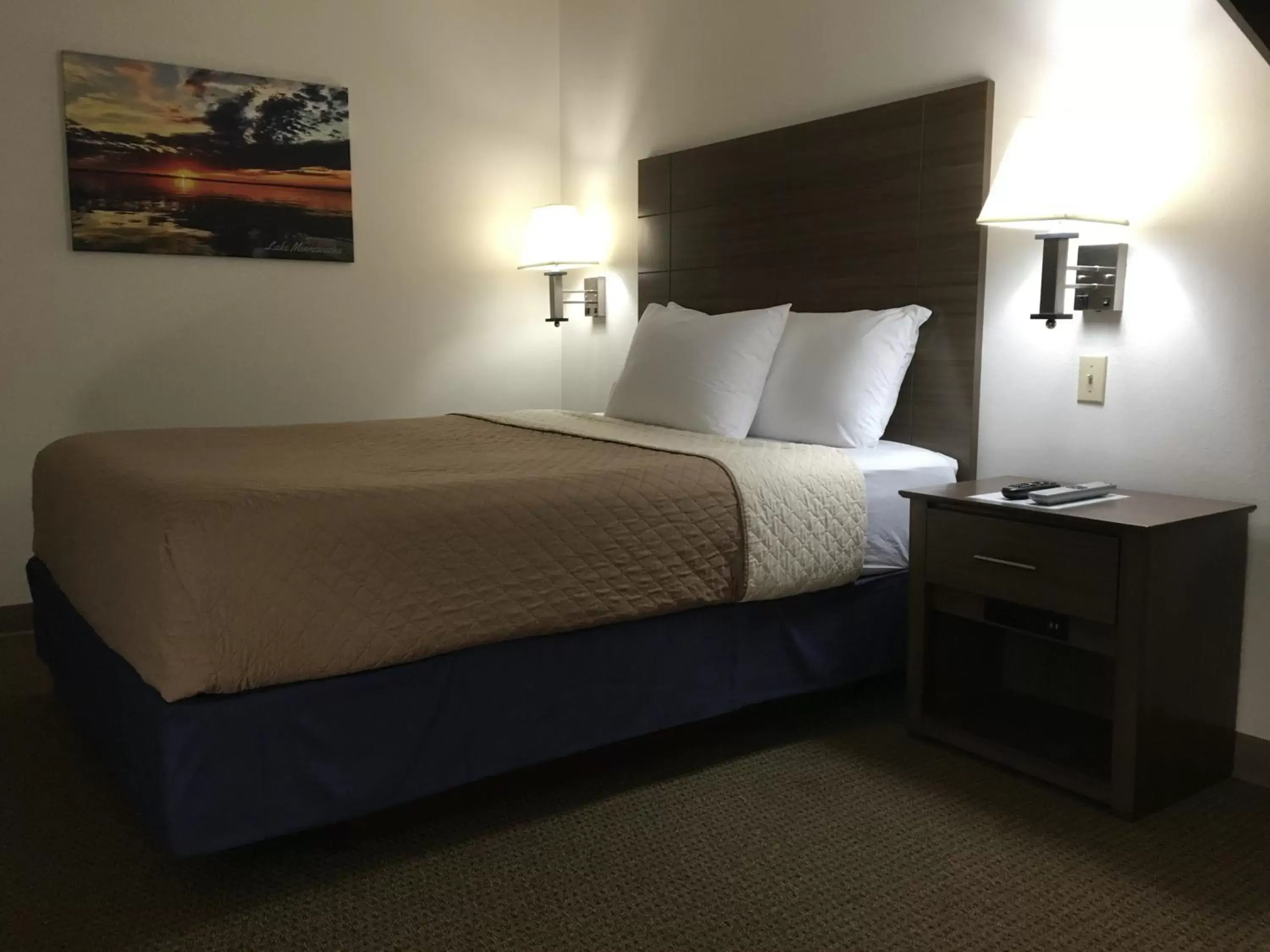 Bed in Lakes Area Inn