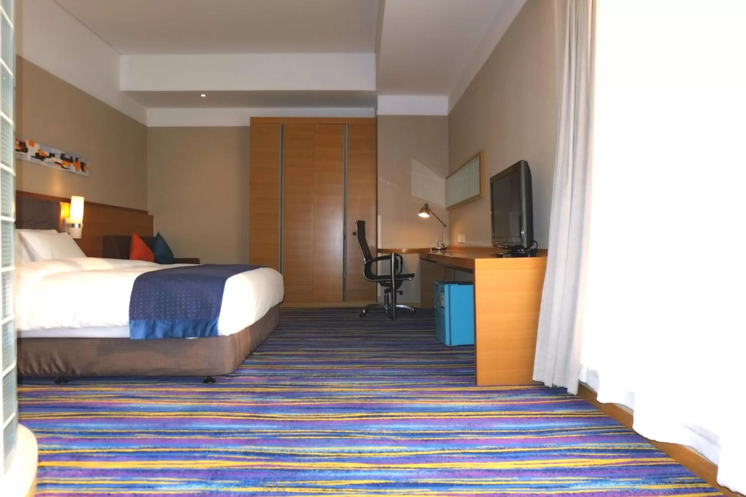 Photo of the whole room, Bed in Holiday Inn Express Tianjin Heping, an IHG Hotel