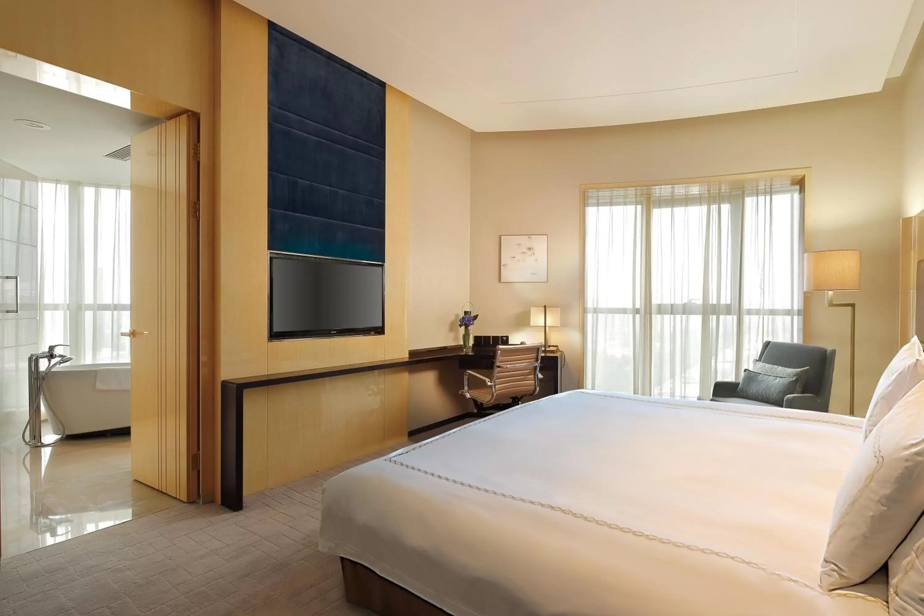 Bed in Crowne Plaza Beijing Lido, an IHG Hotel