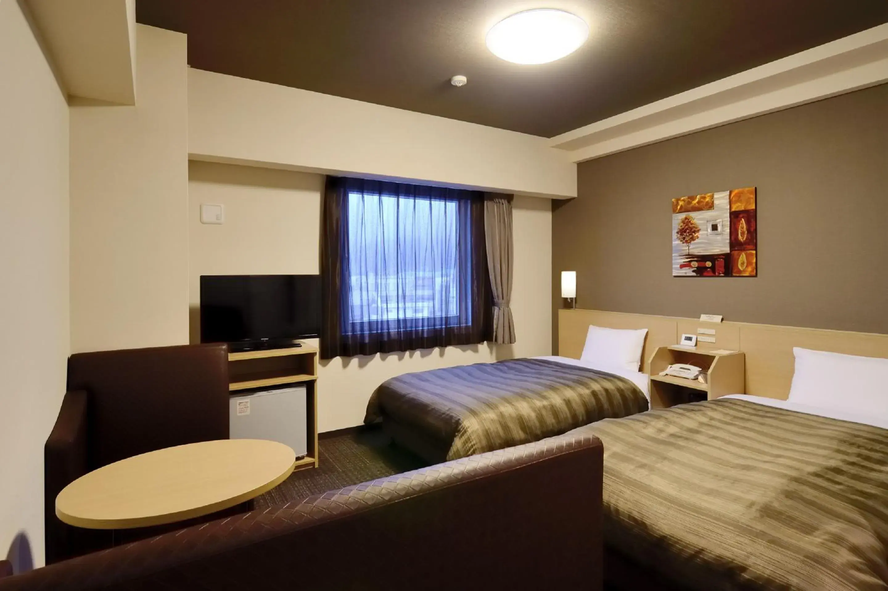 Bed in Hotel Route Inn Sendai Higashi