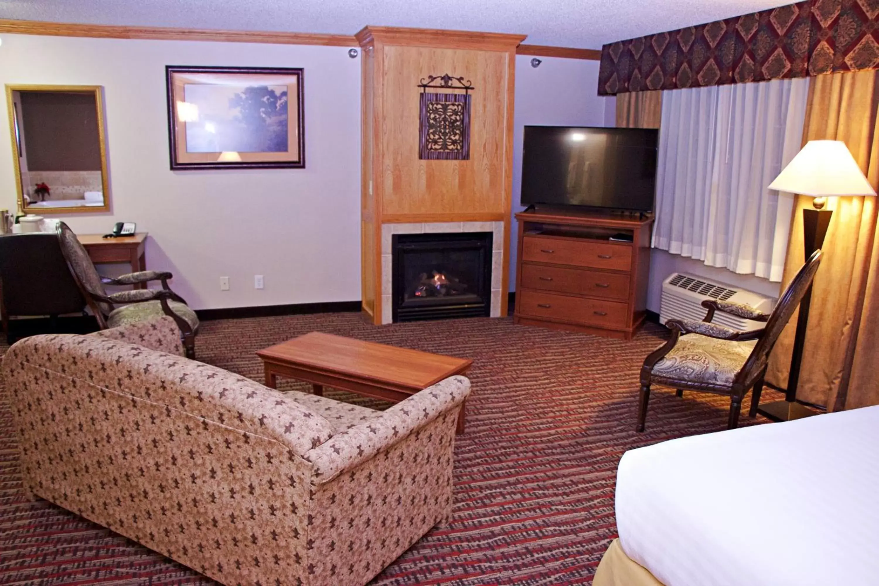 Photo of the whole room, TV/Entertainment Center in Holiday Inn Express Hotel & Suites Pierre-Fort Pierre, an IHG Hotel