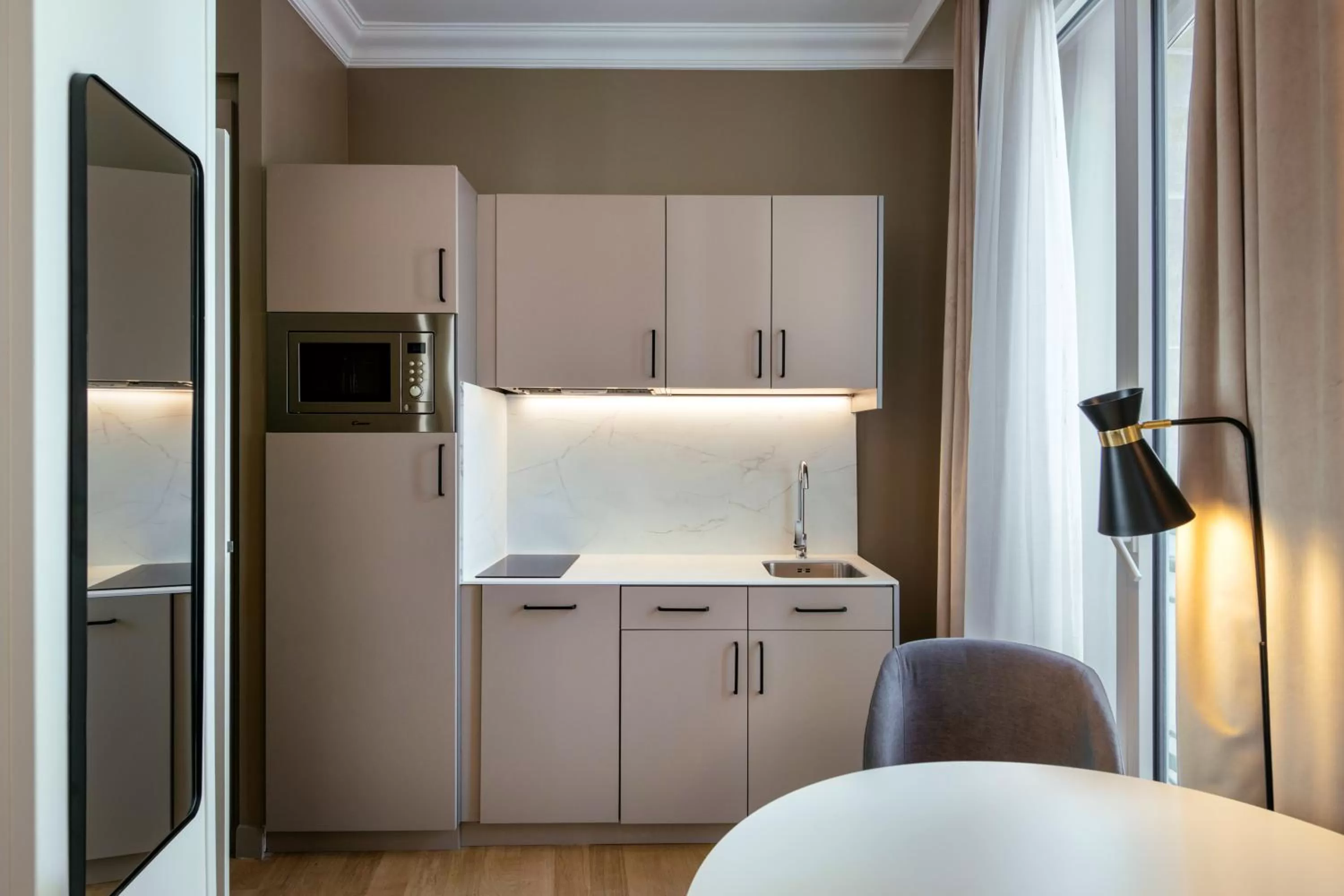 Kitchen or kitchenette in Aparthotel Adagio Paris Opéra