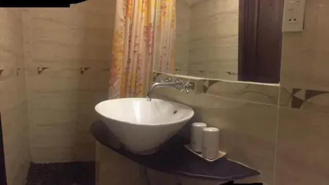 Toilet, Bathroom in Halo Hotel