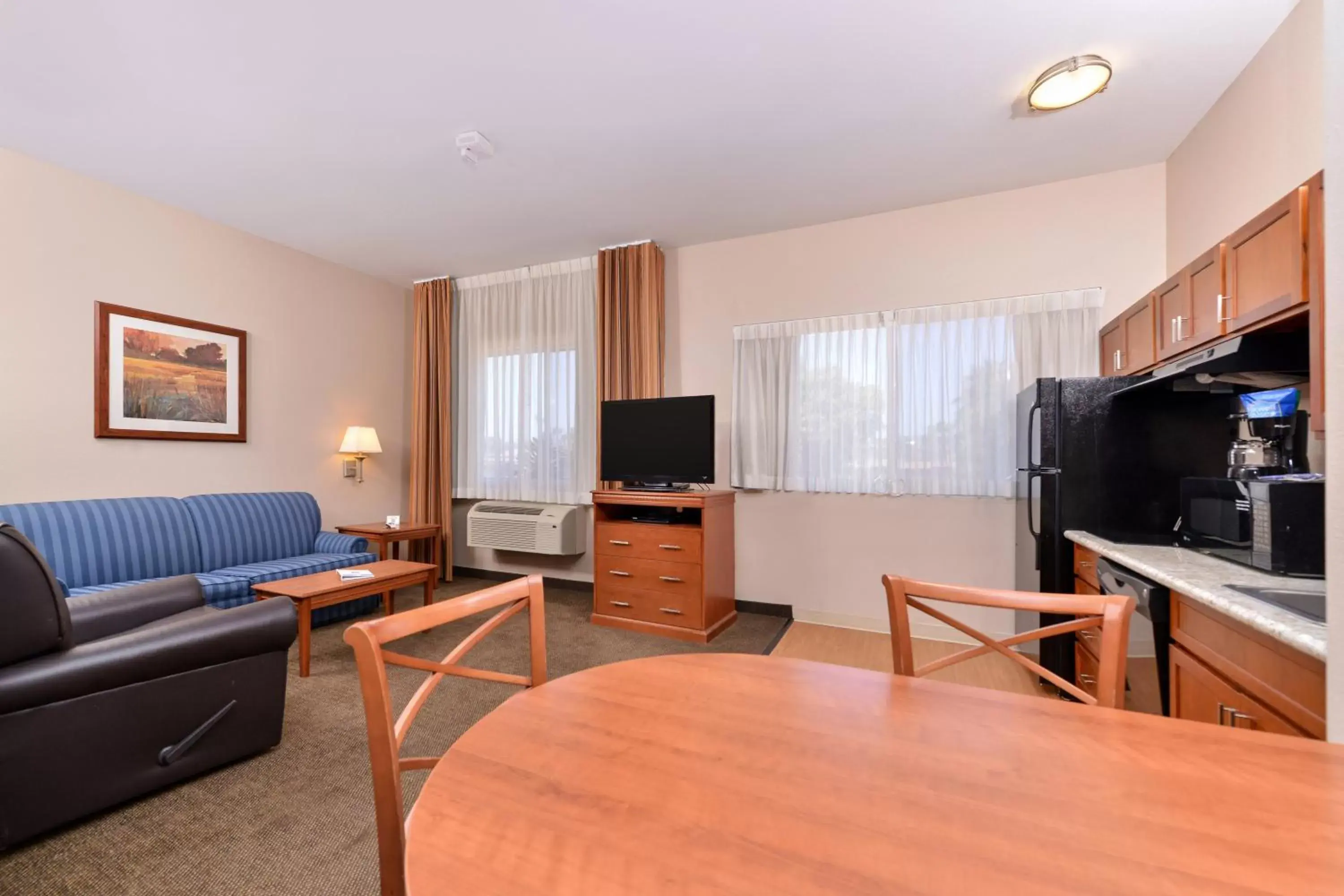 Photo of the whole room, TV/Entertainment Center in Candlewood Suites San Diego, an IHG Hotel