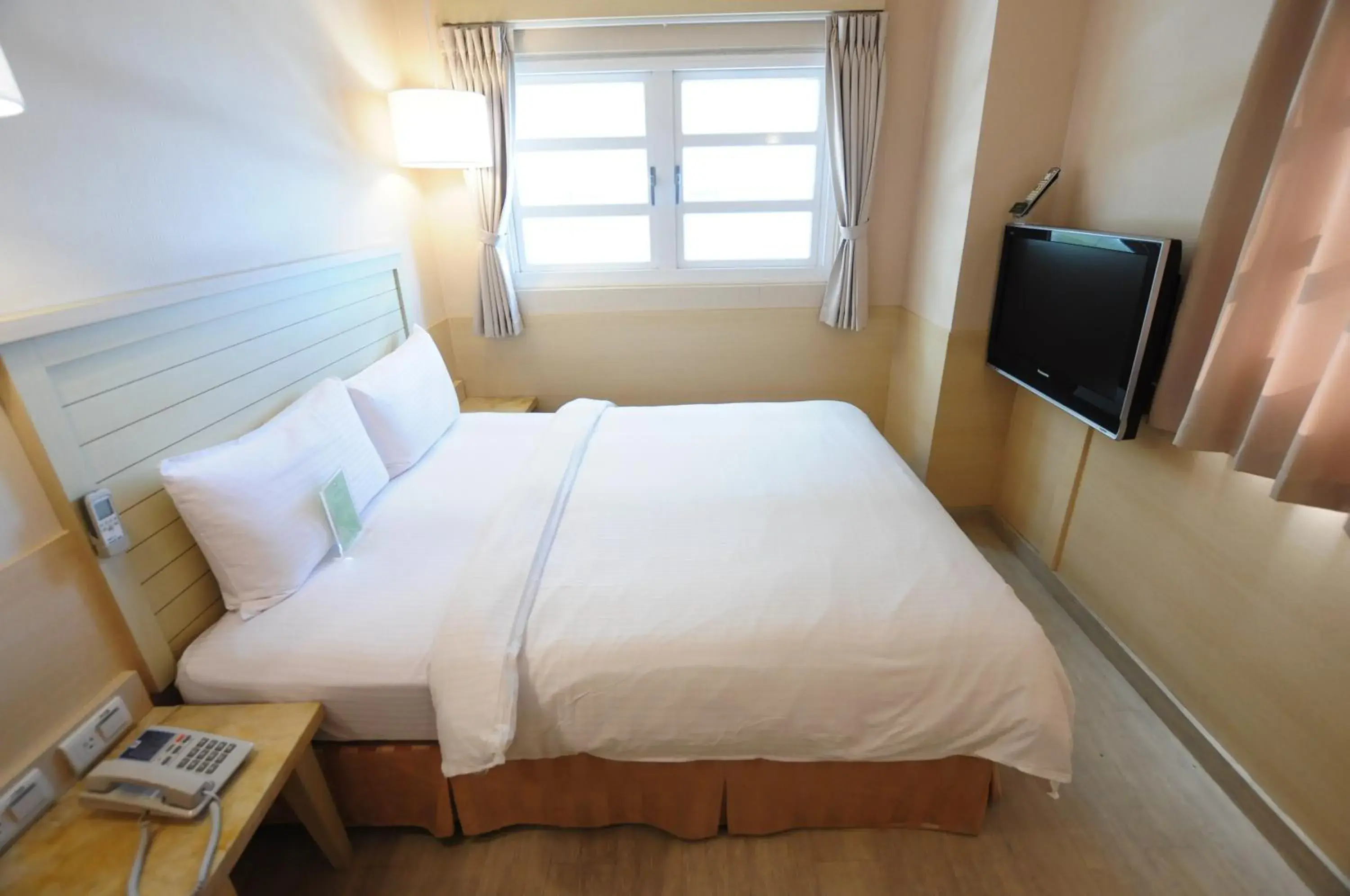 Bedroom, Bed in Kindness Hotel Min Sheng