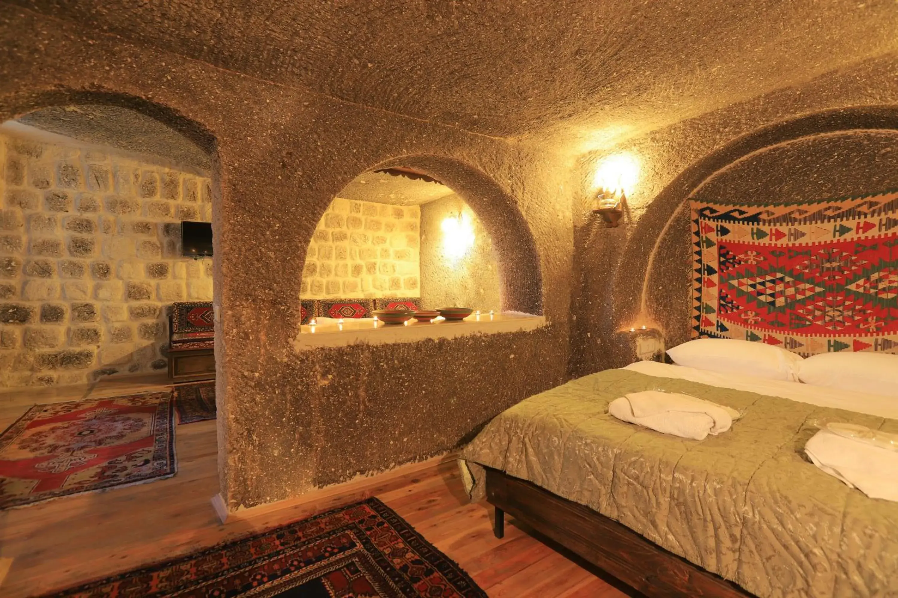 Property building, Bed in Antique Terrace Cave Suites