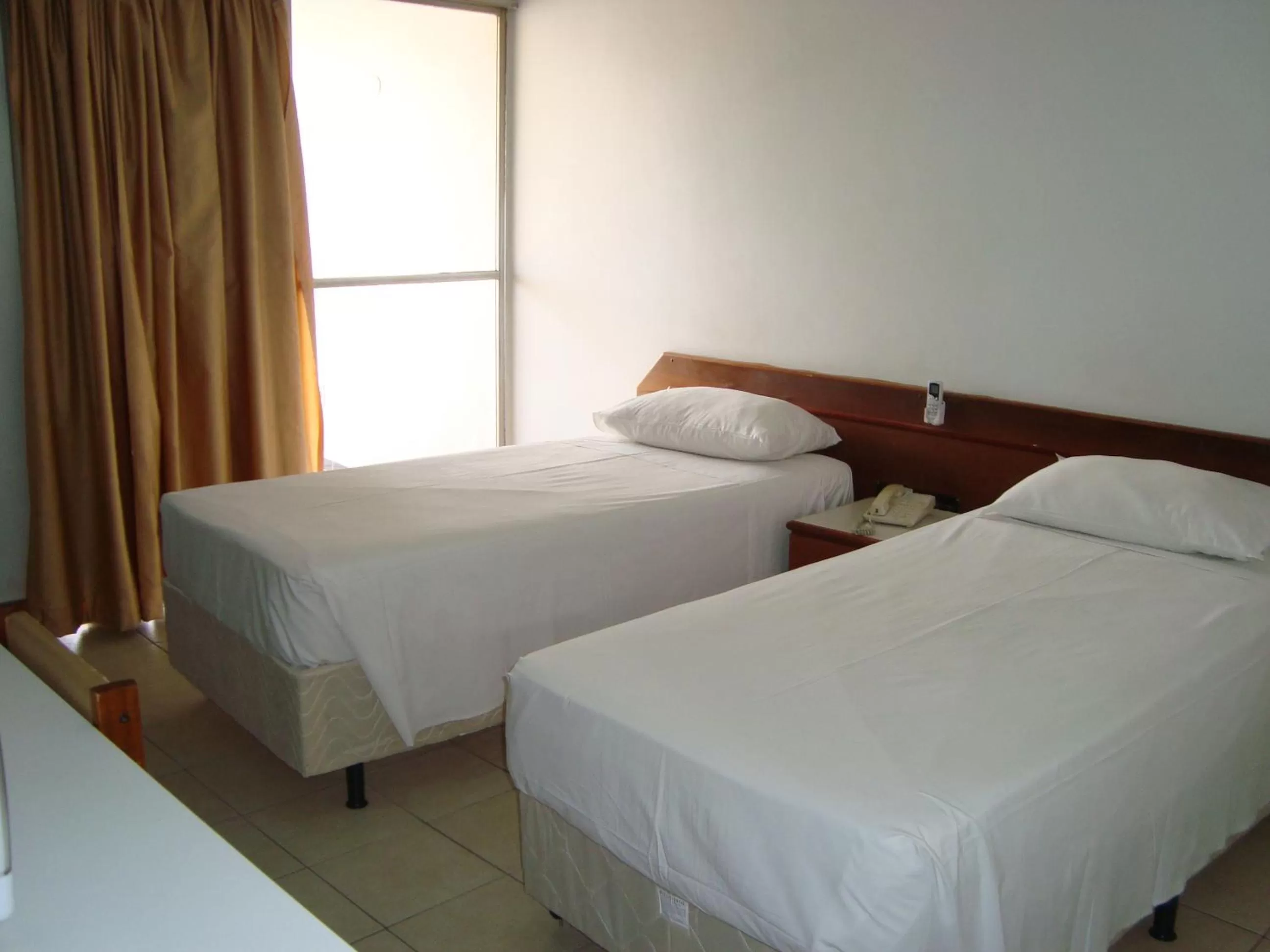 Bed in ABC Apart Hotel