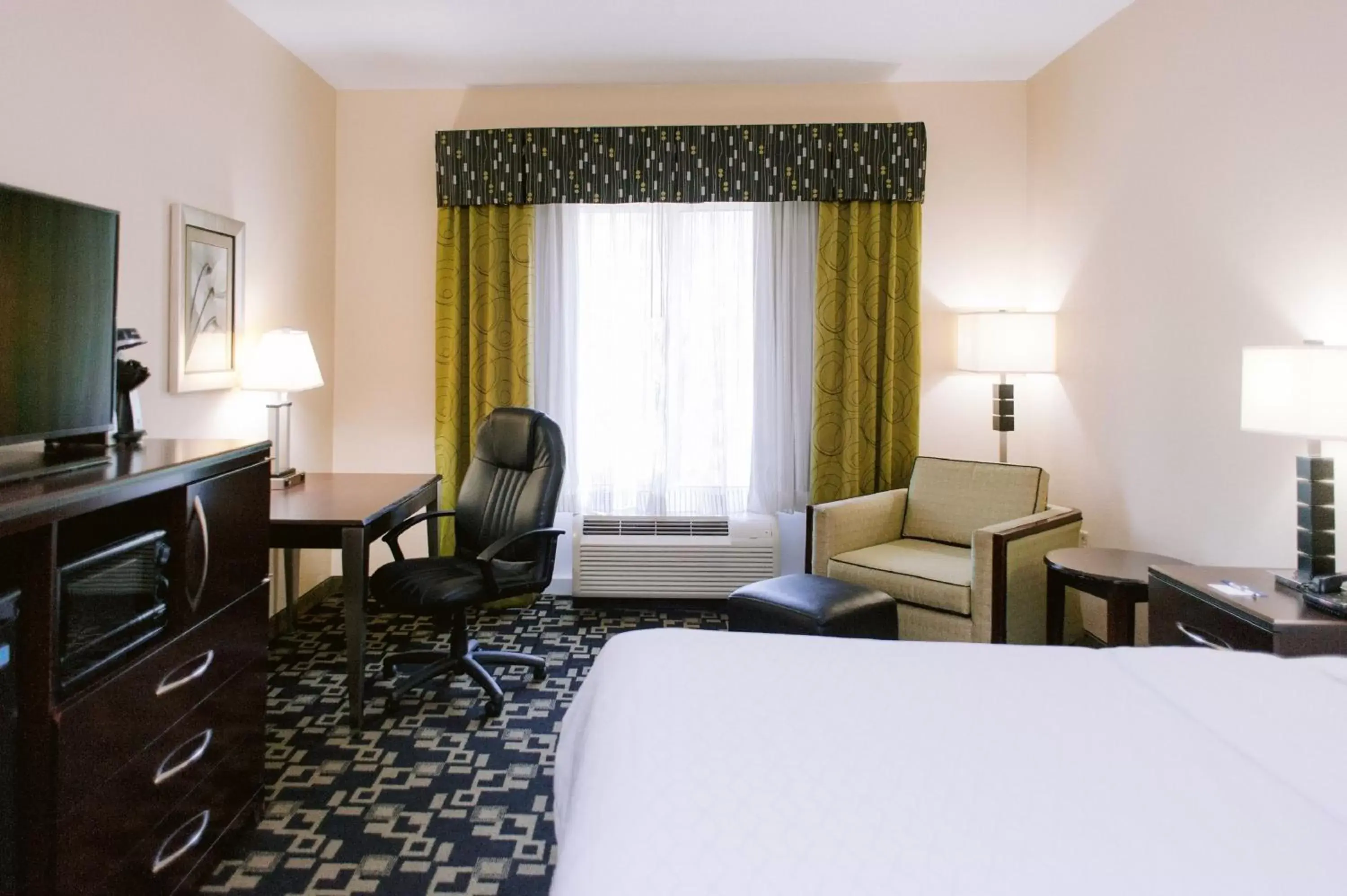 Photo of the whole room, Seating Area in Holiday Inn Express Hotel Raleigh Southwest, an IHG Hotel