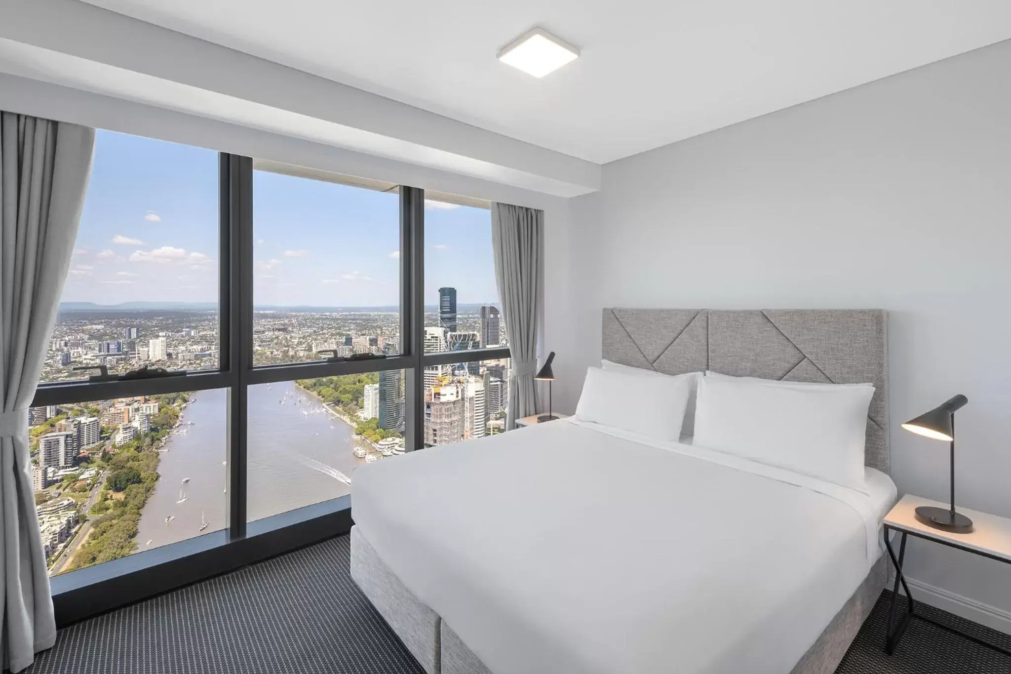 Bed in Meriton Suites Adelaide Street, Brisbane