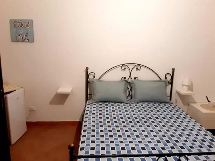 Bed in Nostra Casa suite