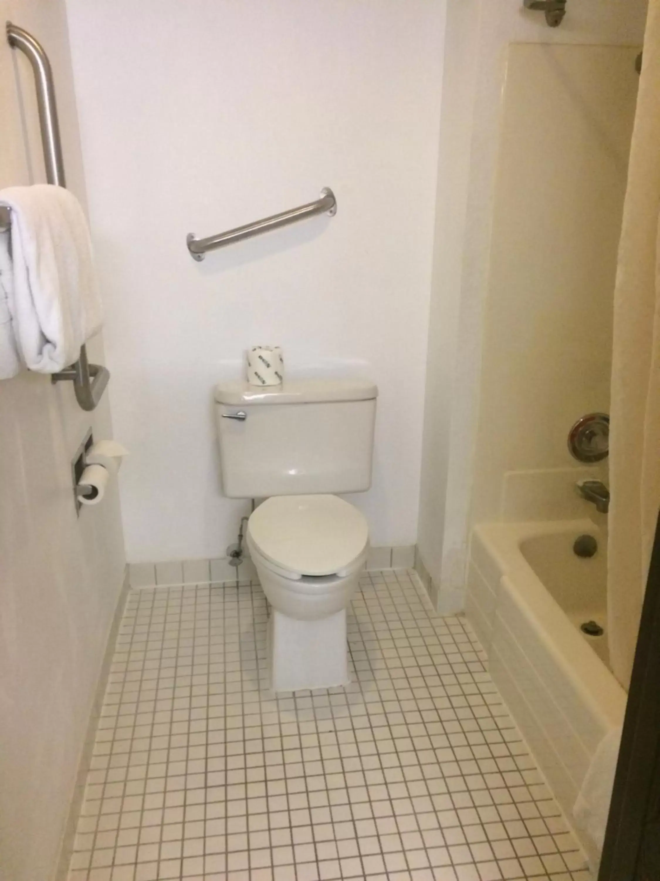Bathroom in Travelodge by Wyndham Brooklyn Center