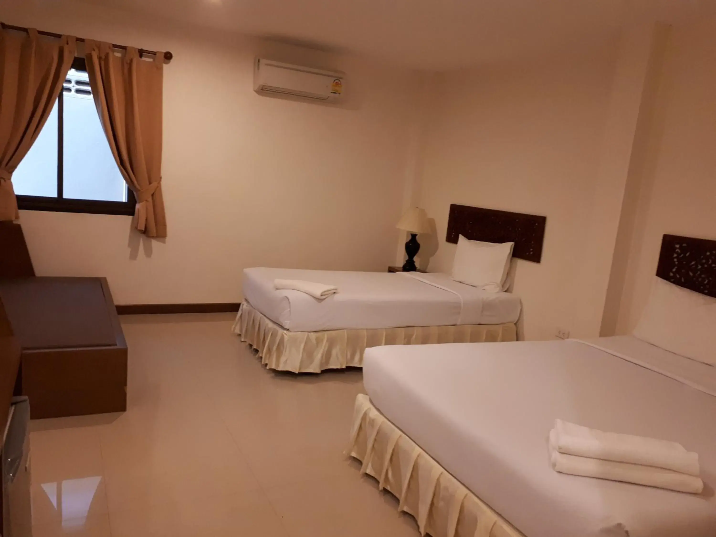 Bed in Nathon Residence Hotel