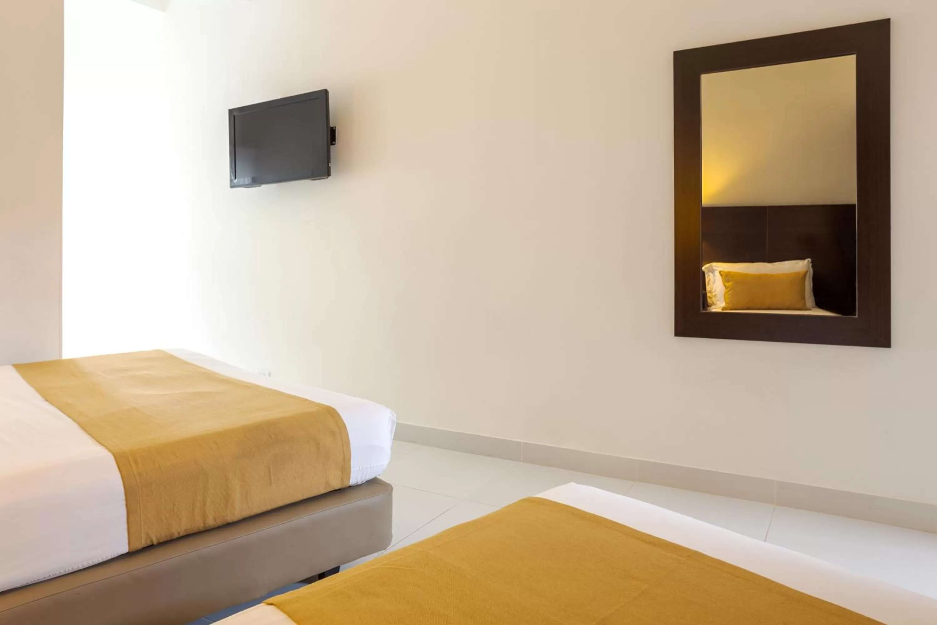 TV and multimedia, Bed in Hotel Manantial Melgar