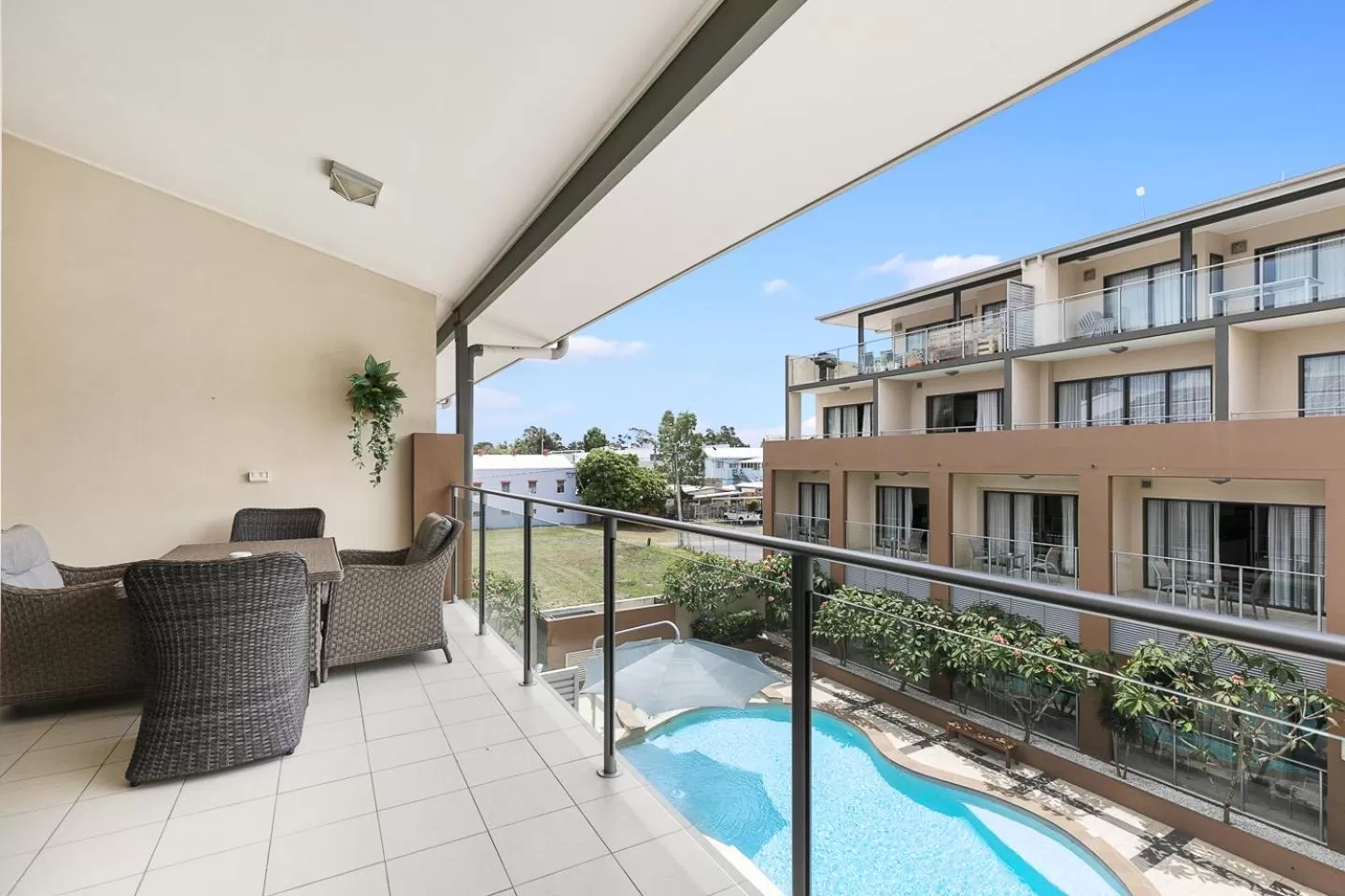Balcony/Terrace, Pool View in Eden by the Bay