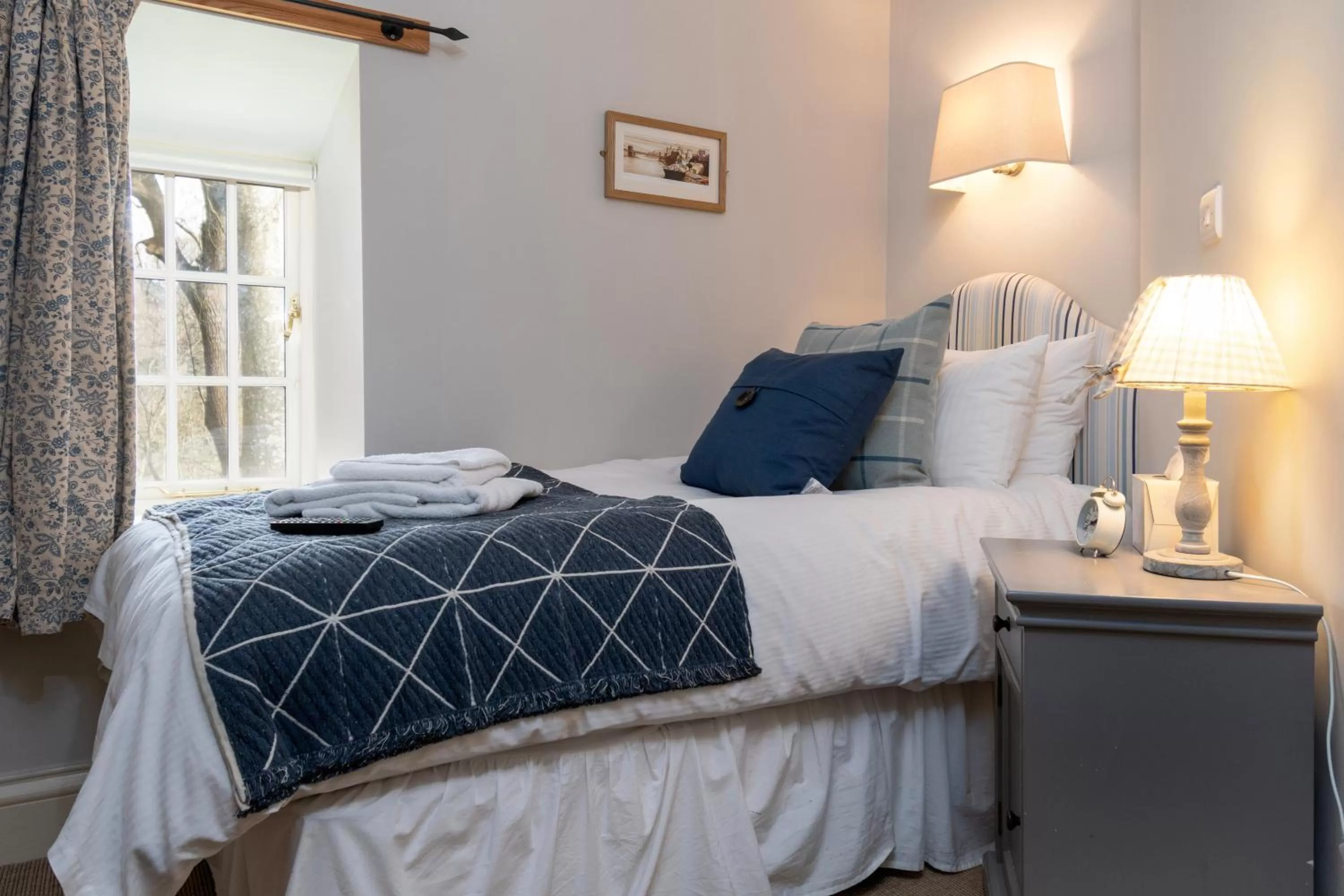 Photo of the whole room, Bed in The Farmhouse at Bodnant Welsh Food