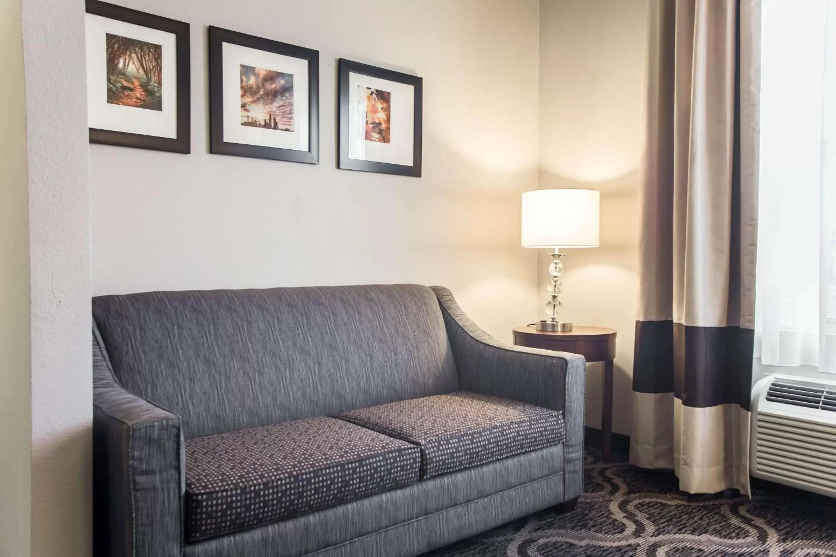 Bedroom, Seating Area in Comfort Suites Pineville - Ballantyne Area