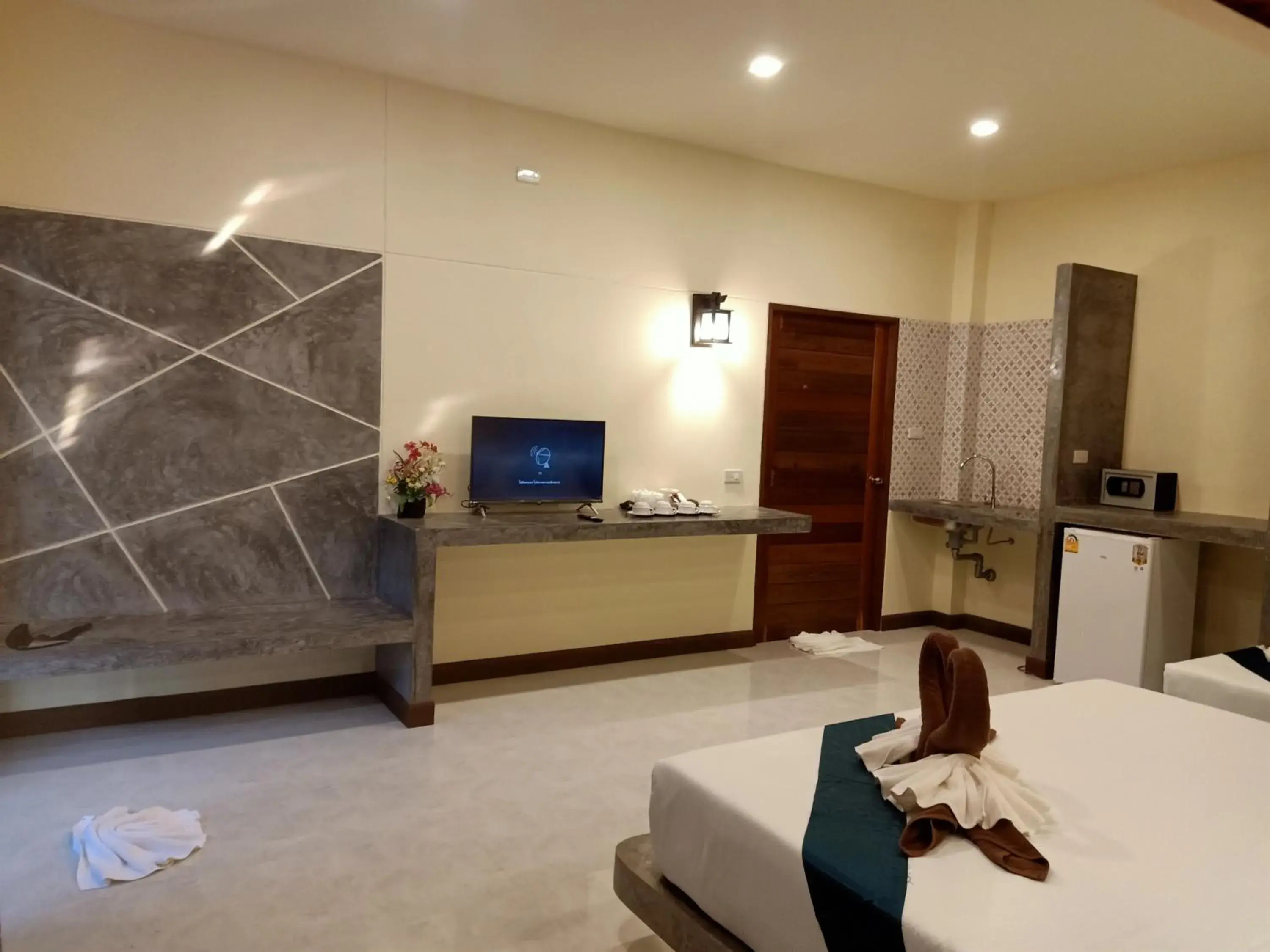 Bed, TV/Entertainment Center in Lanta Pearl Beach Resort