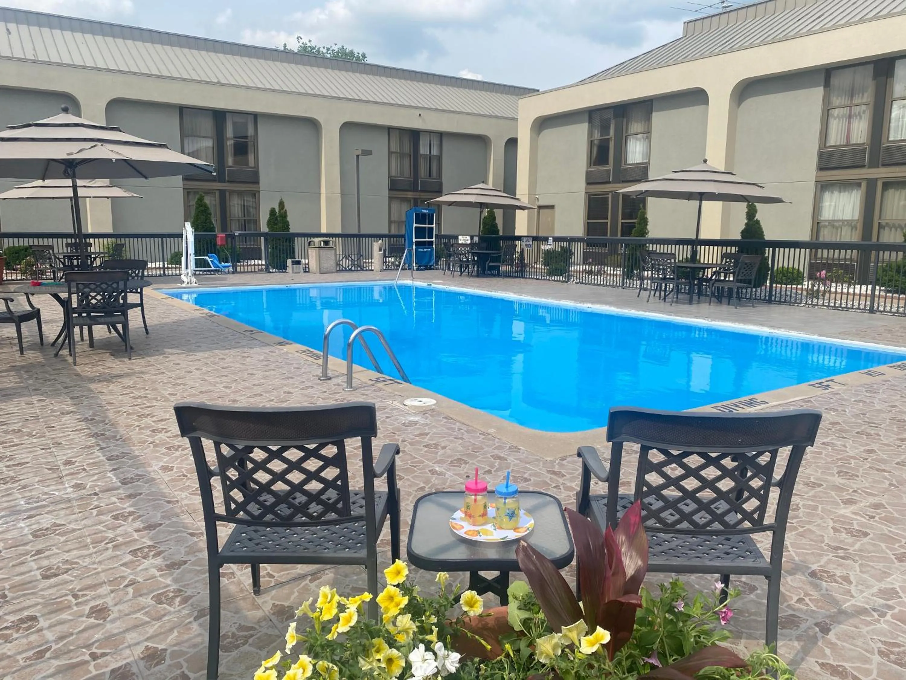 Swimming pool in Clarion Inn & Suites Grand Rapids Airport