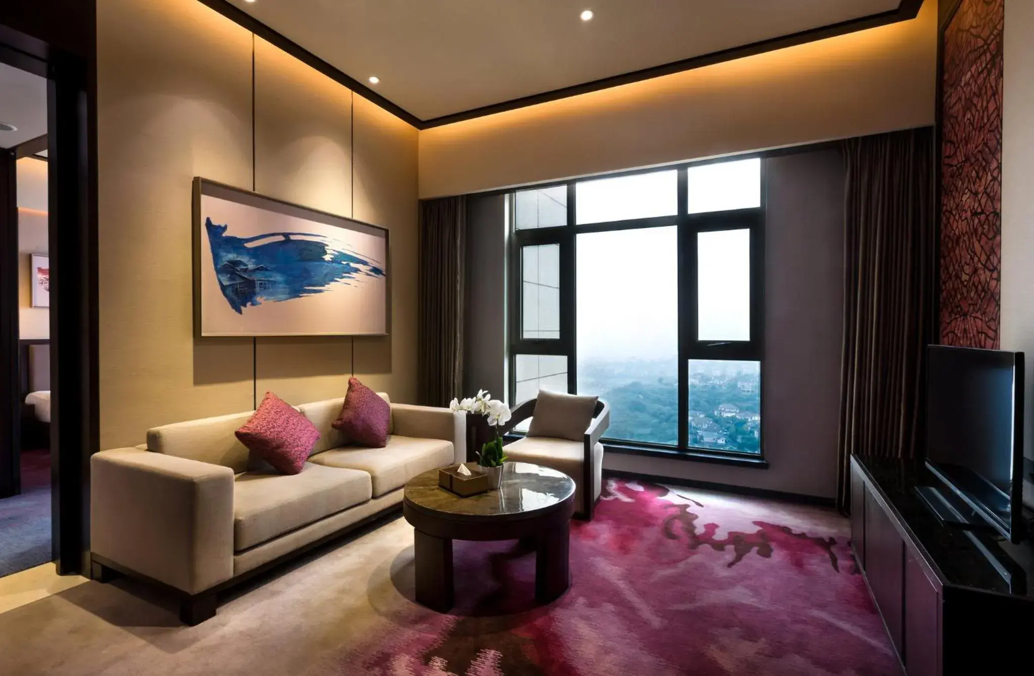 Photo of the whole room, Seating Area in Crowne Plaza Chongqing New North Zone, an IHG Hotel