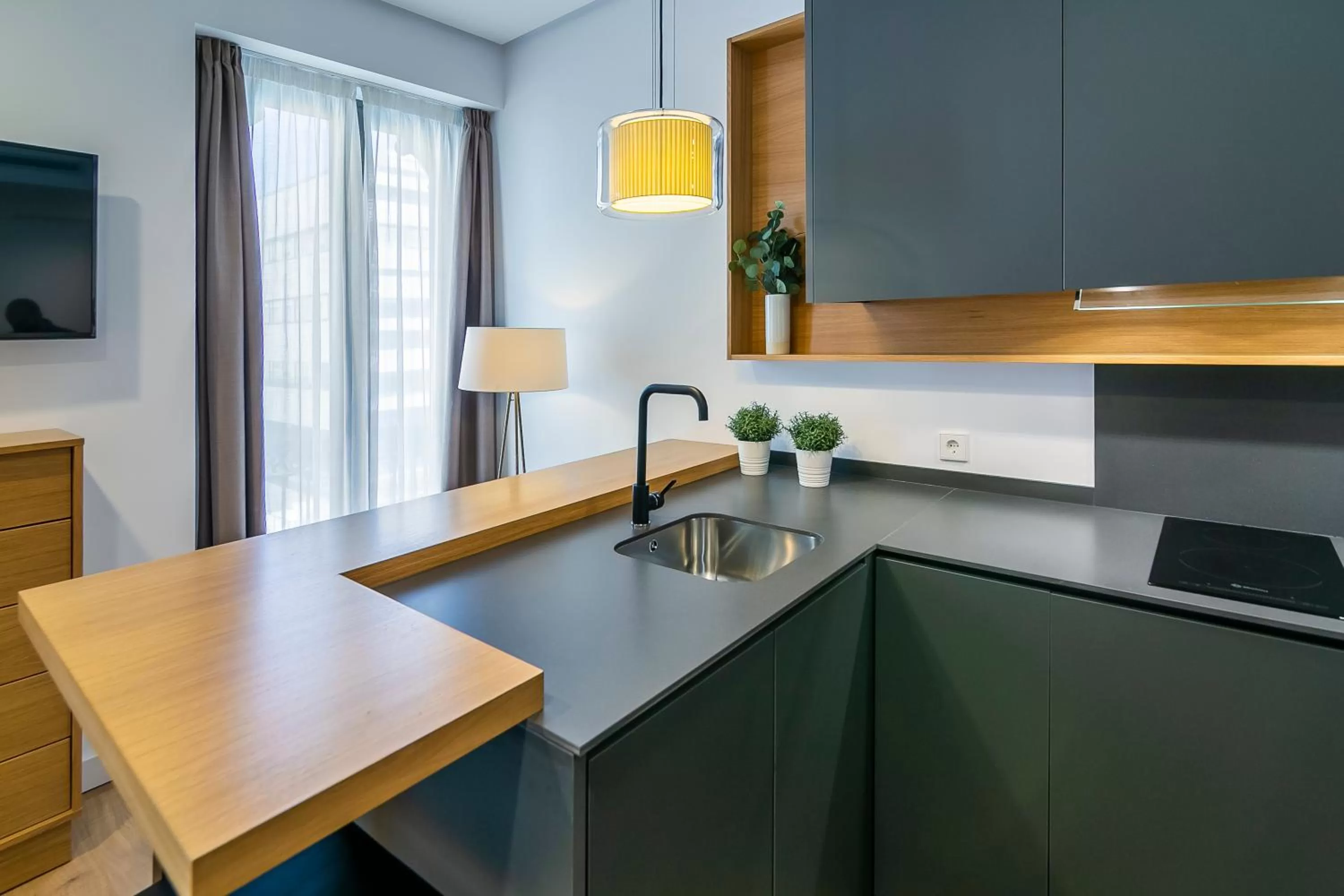Kitchen or kitchenette in Aquitania Home Suites
