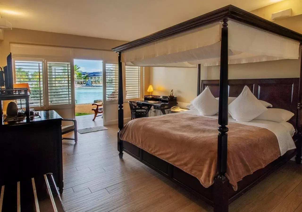 Bed in Plantation Bay Resort and Spa