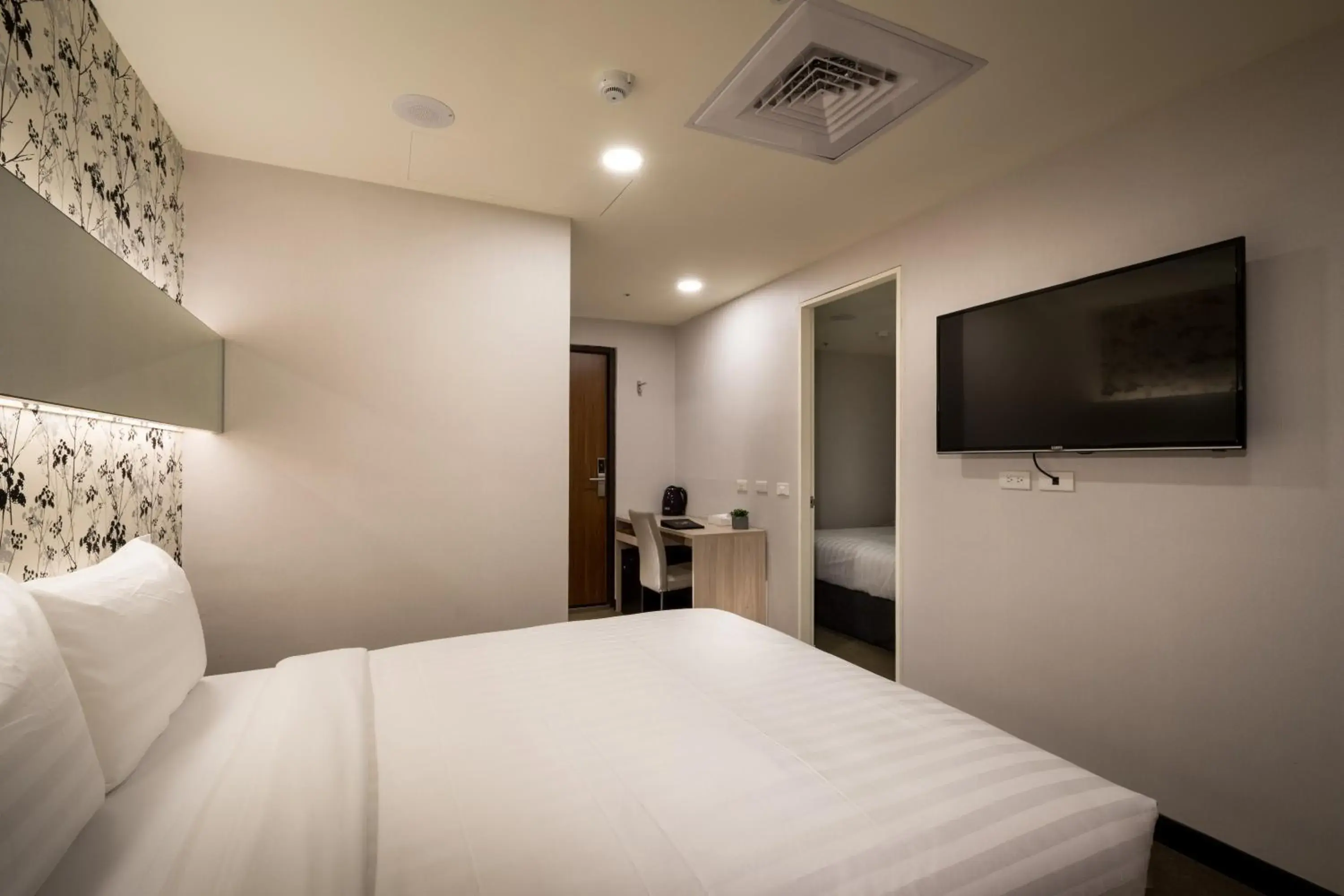 Bed in Urhome Hotel