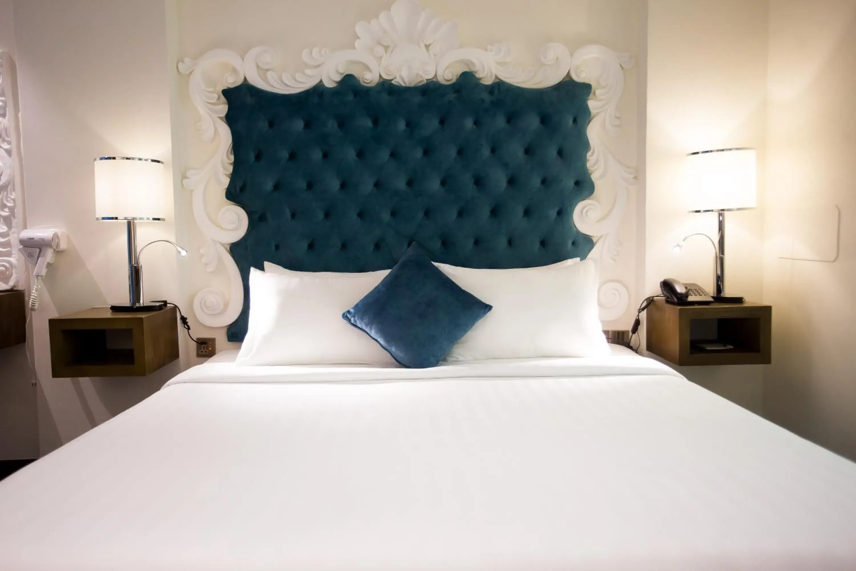 Bed in Blue Diamond Luxury Hotel