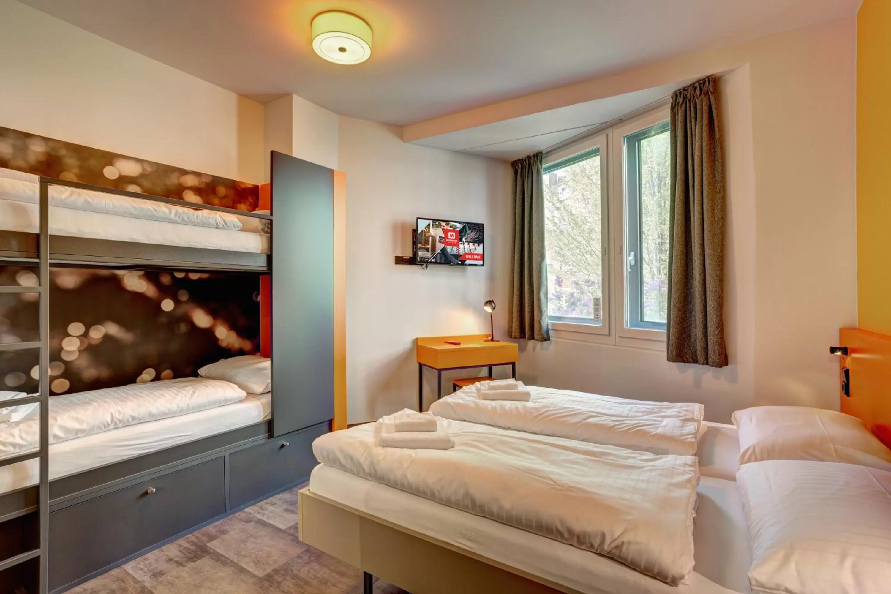 Photo of the whole room, Bed in MEININGER Hotel München Olympiapark