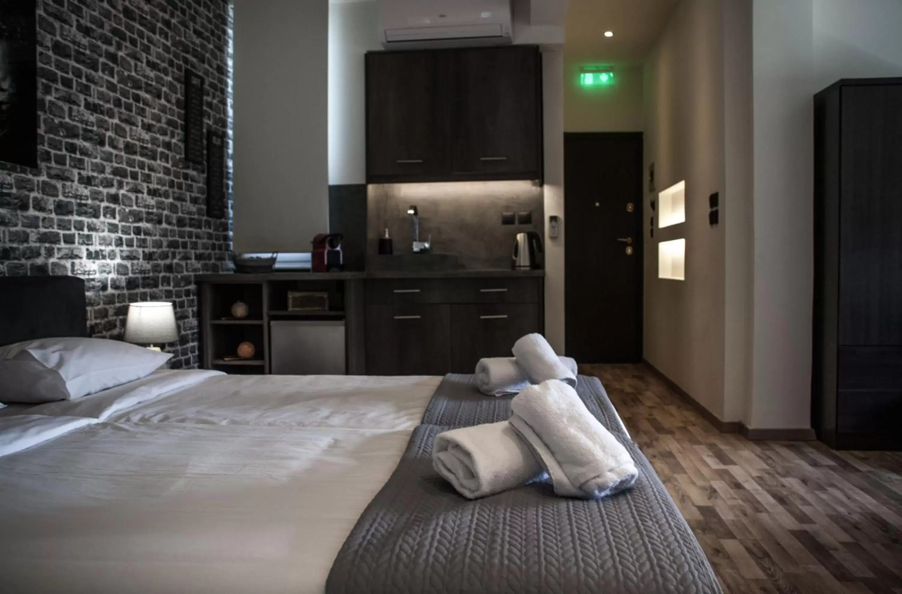 Kitchen or kitchenette, Bed in The Athens Version Luxury Suites