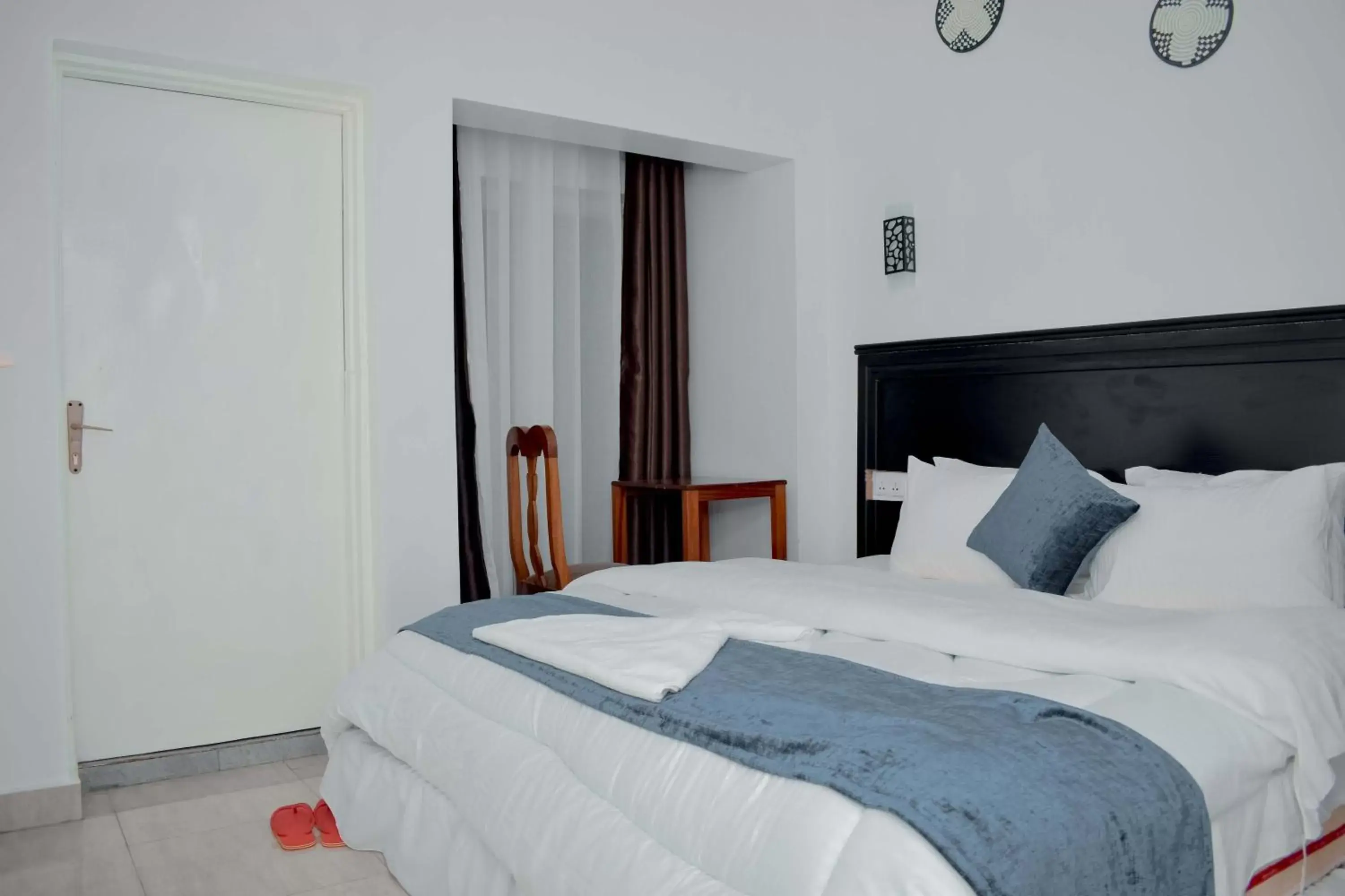 Double Room with Balcony - single occupancy in INZOZI AFRICA HOUSE B&B-Gishushu Double Room with Balcony - single occupancy in INZOZI AFRICA HOUSE B&B-Gishushu