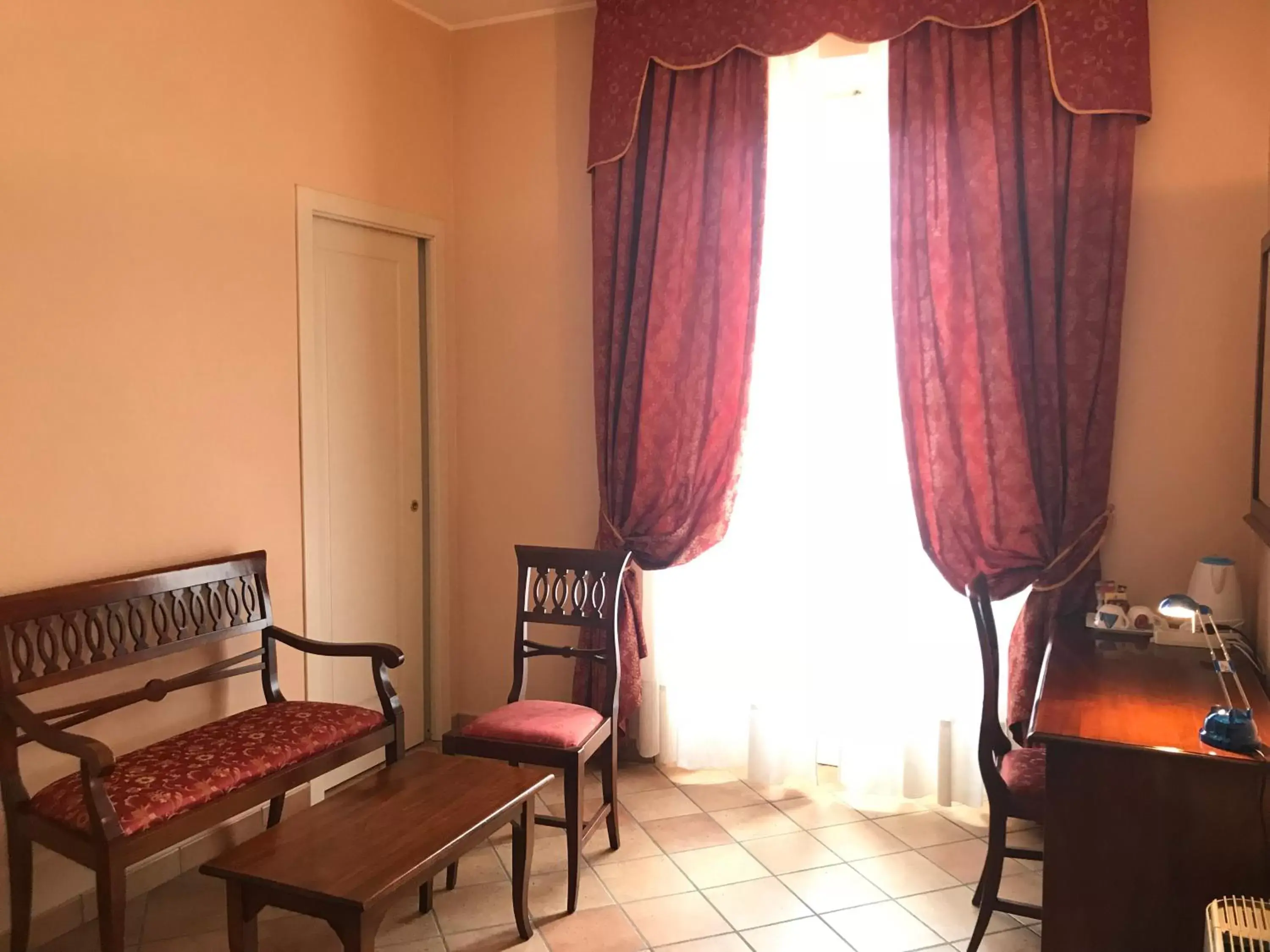 Bedroom, Seating Area in Locanda Ca’ Rossa