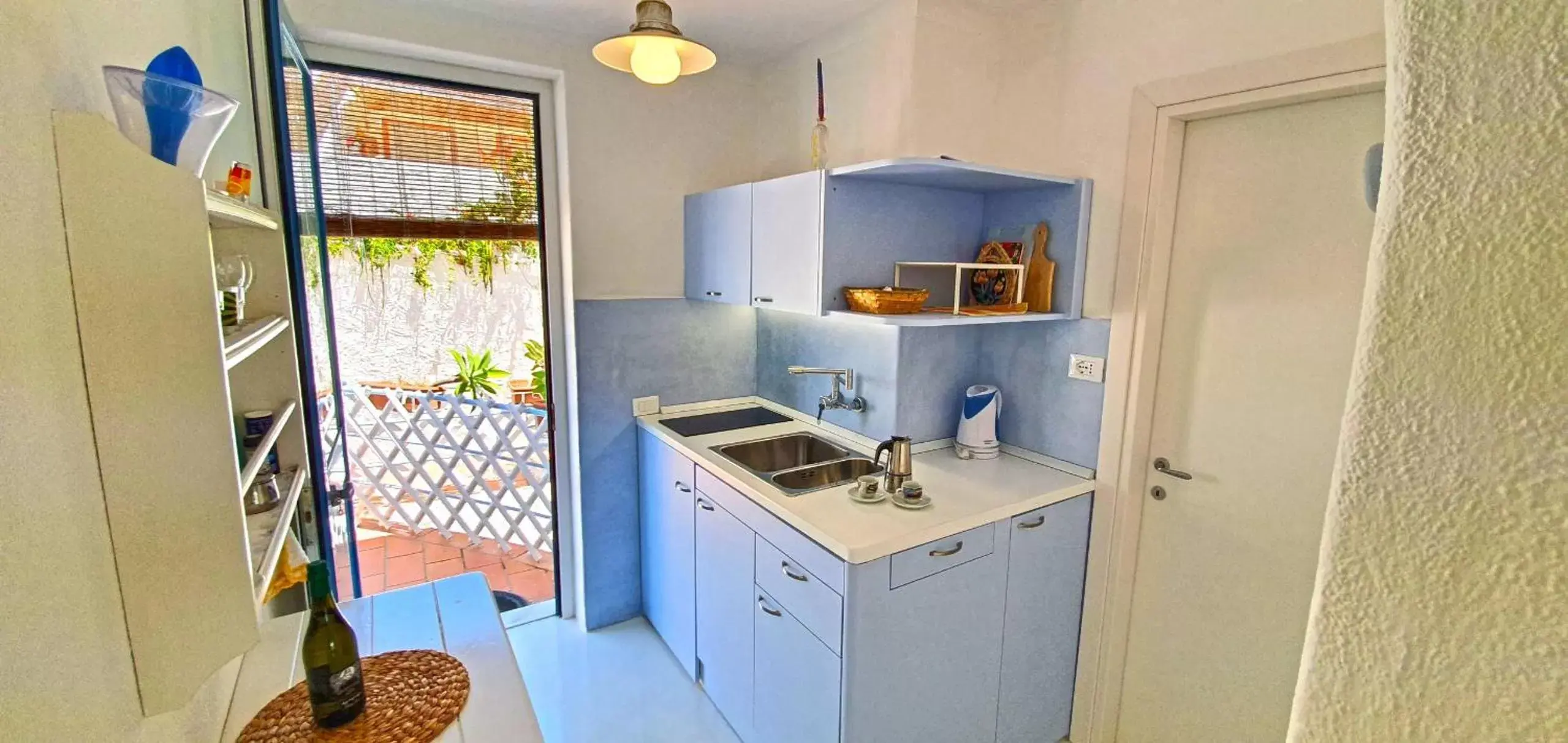 Coffee/tea facilities, Kitchen/Kitchenette in Villa Ravino Aparthotel