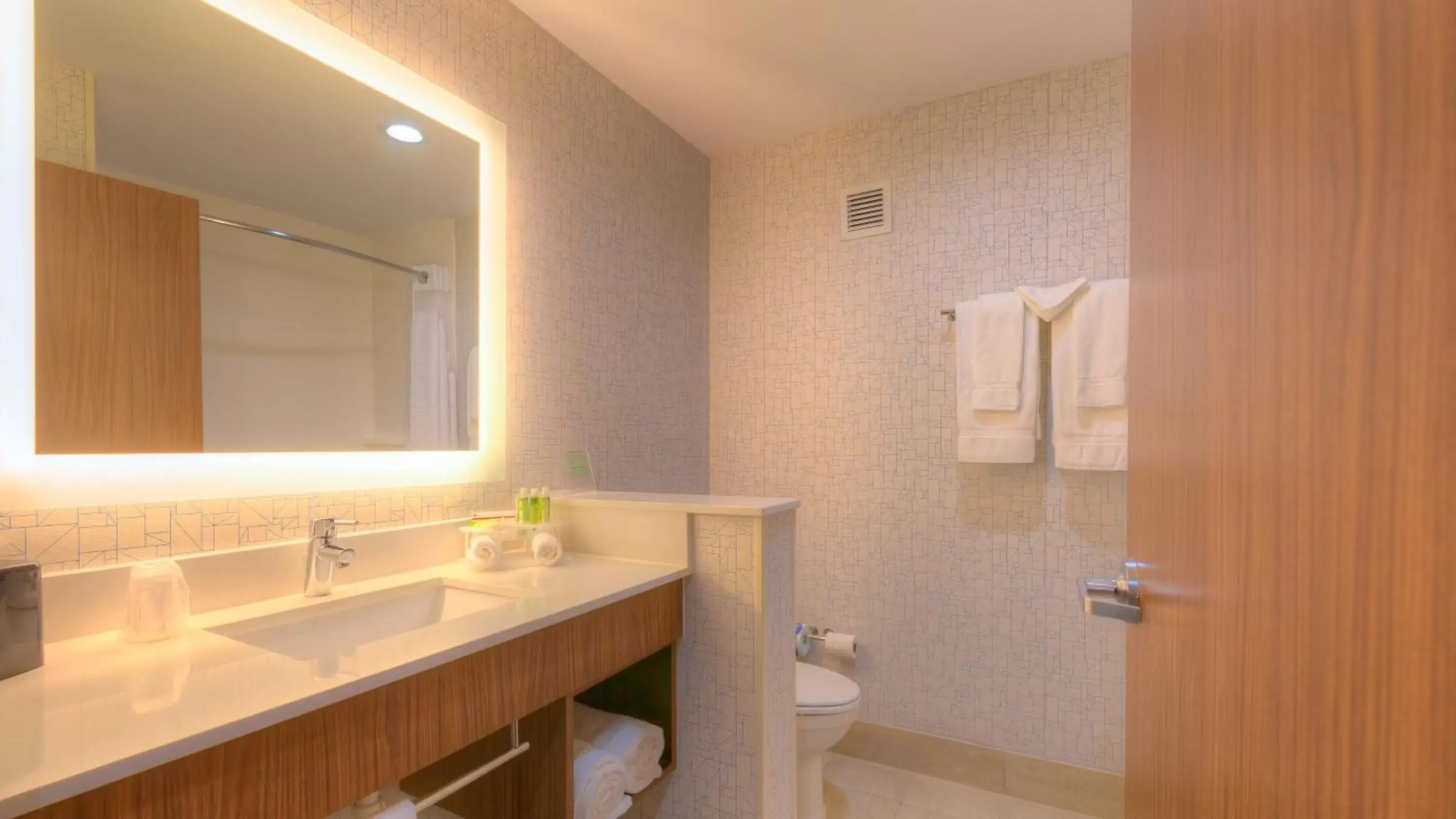 Bathroom in Holiday Inn Express & Suites Tulsa Midtown, an IHG Hotel